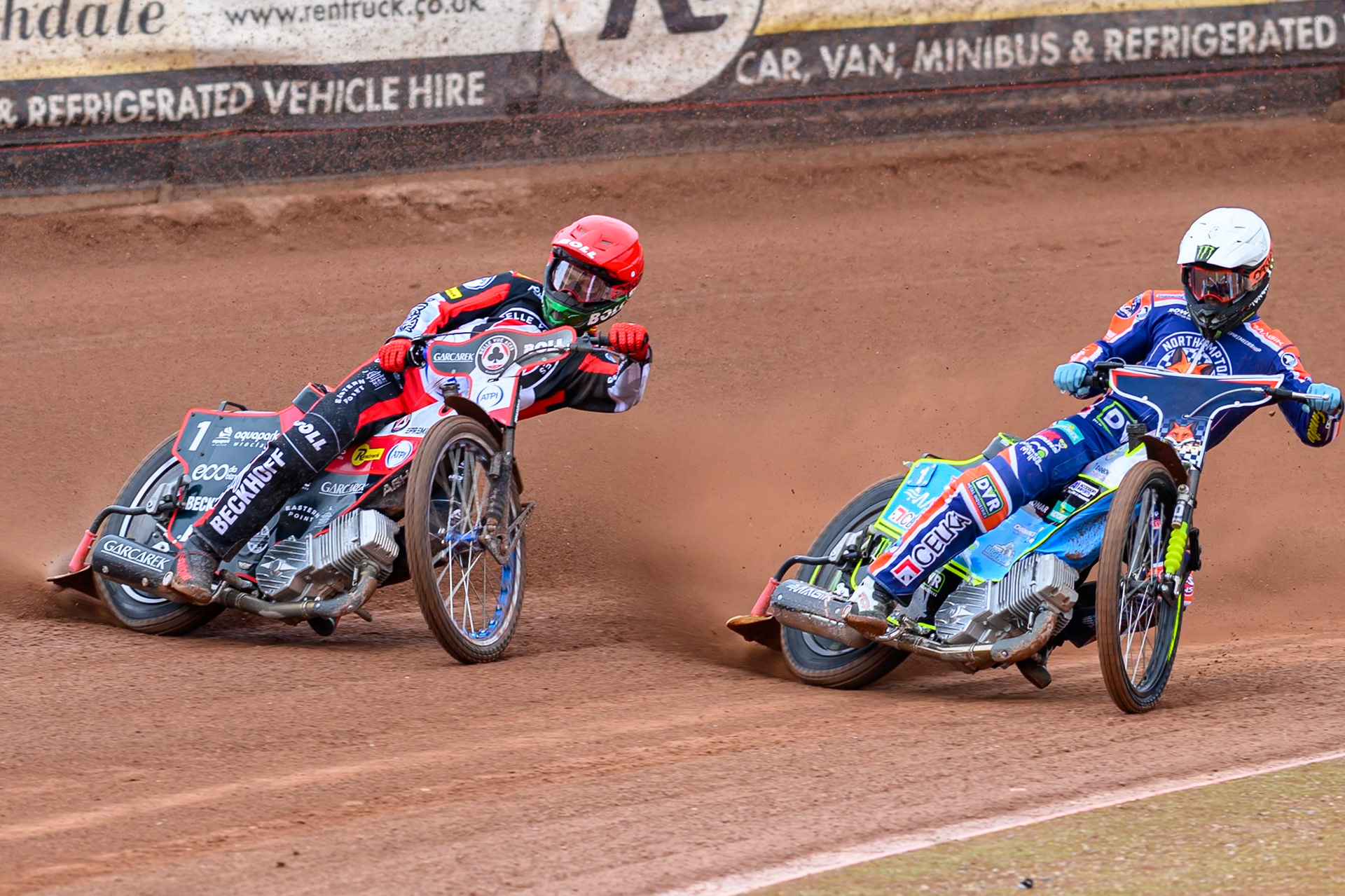 Jaimon Lidsey of Northampton Foxes  in White rides inside Brady Kurtz of Belle Vue Aces  in Red during the Rowe Motor Oil Premiership match between Belle Vue Aces and Northampton Foxes at the National Speedway Stadium, Manchester on Monday 4th May 2026. (Photo: Ian Charles | MI News)