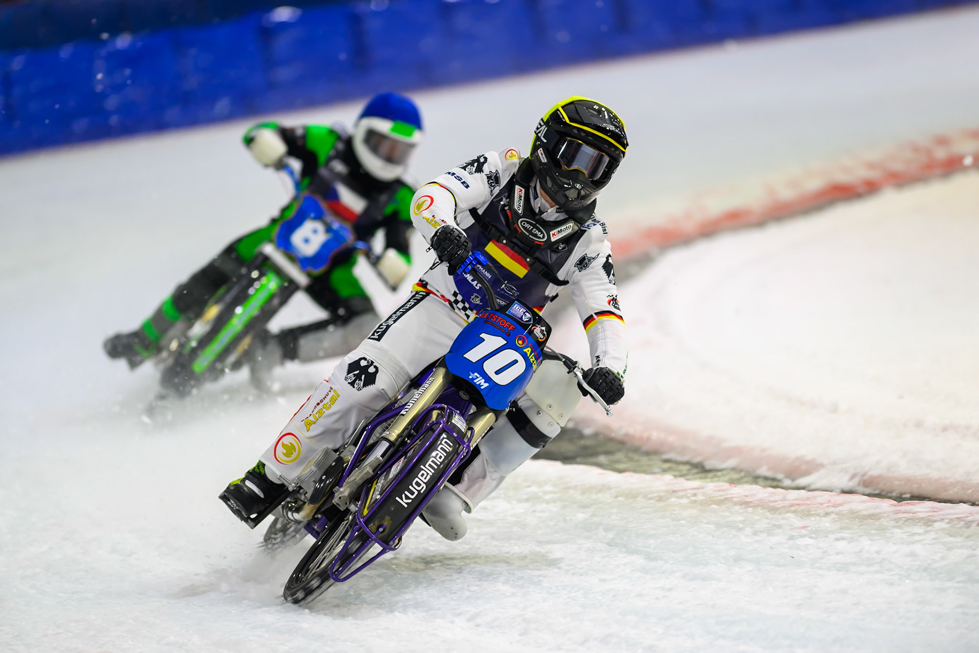 Christoph Kirchner (10) of Germany in Yellow leading Andrej Diviš (8) of Czechia  in Blue during the FIM Ice Speedway Of Nations at Ice Rink Thialf, Heerenveen on Sunday 12th April 2026. (Photo: Ian Charles | MI News)