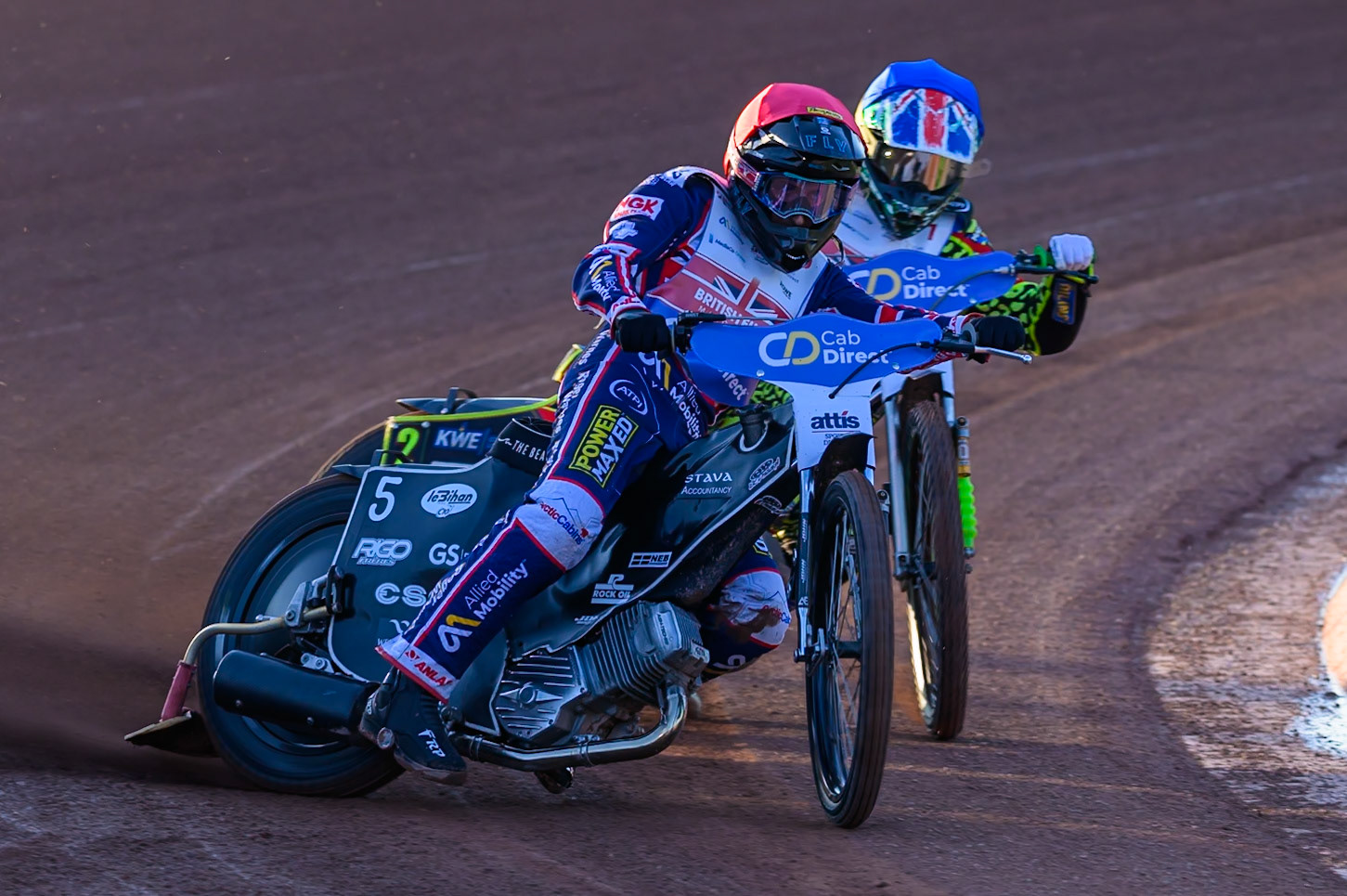 Adam Ellis (5) in Red leading Will Cairns (7) in Blue during the Cab Direct British Speedway Championship Final at the National Speedway Stadium, Manchester on Saturday 15th August 2026. (Photo: Ian Charles | MI News)