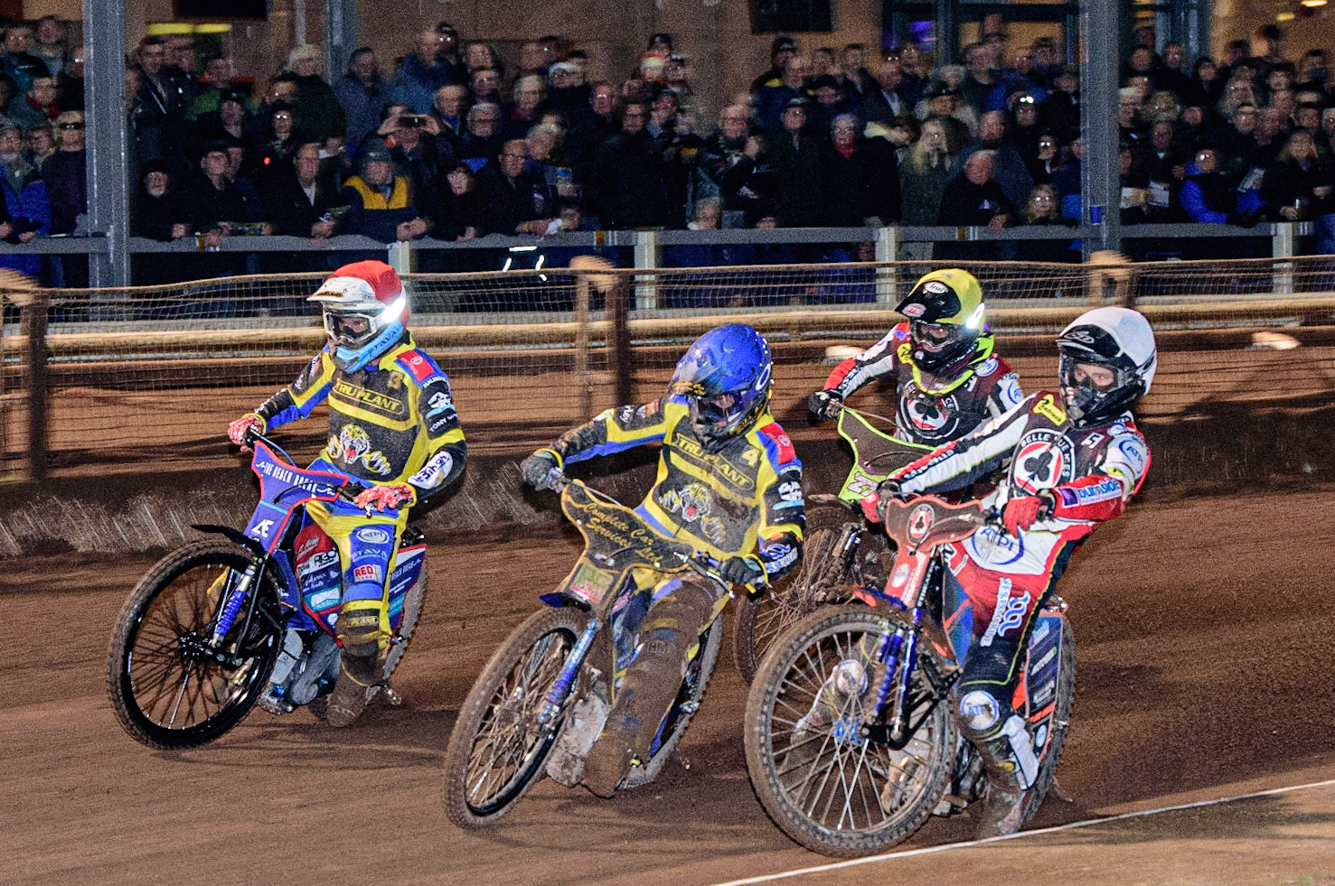 Brady Kurtz  (White) inside Kyle Howarth  (Blue) and Adam Ellis  (Red) with Tom Brennan  (Yellow) behind during the Sheffield Tigers vs Belle Vue Aces meeting in the SGP Premiership at Owlerton Stadium, Sheffield on Thursday 23rd March 2023. (Photo: Ian Charles | MI News)