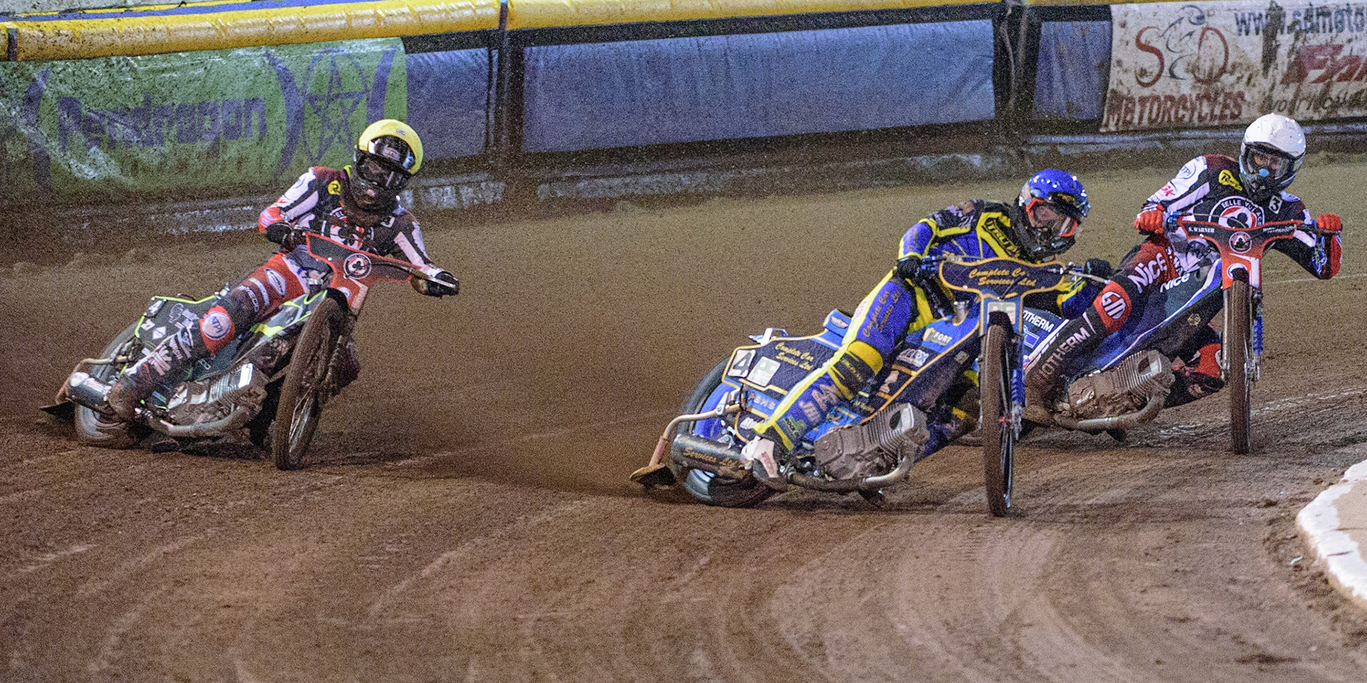 Kyle Howarth  (Blue) leads Tom Brennan   (Yellow) and Matej Zagar  (White) during the SGB Premiership Grand Final 2nd Leg between Sheffield Tigers and Belle Vue Aces at Owlerton Stadium, Sheffield on Thursday 13th October 2022. (Credit: Ian Charles | MI News)