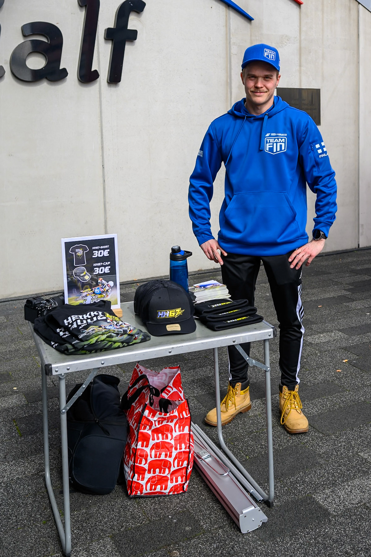 Heikki Huusko sells his merch during the FIM Ice Speedway Of Nations at Ice Rink Thialf, Heerenveen on Sunday 12th April 2026. (Photo: Ian Charles | MI News)
