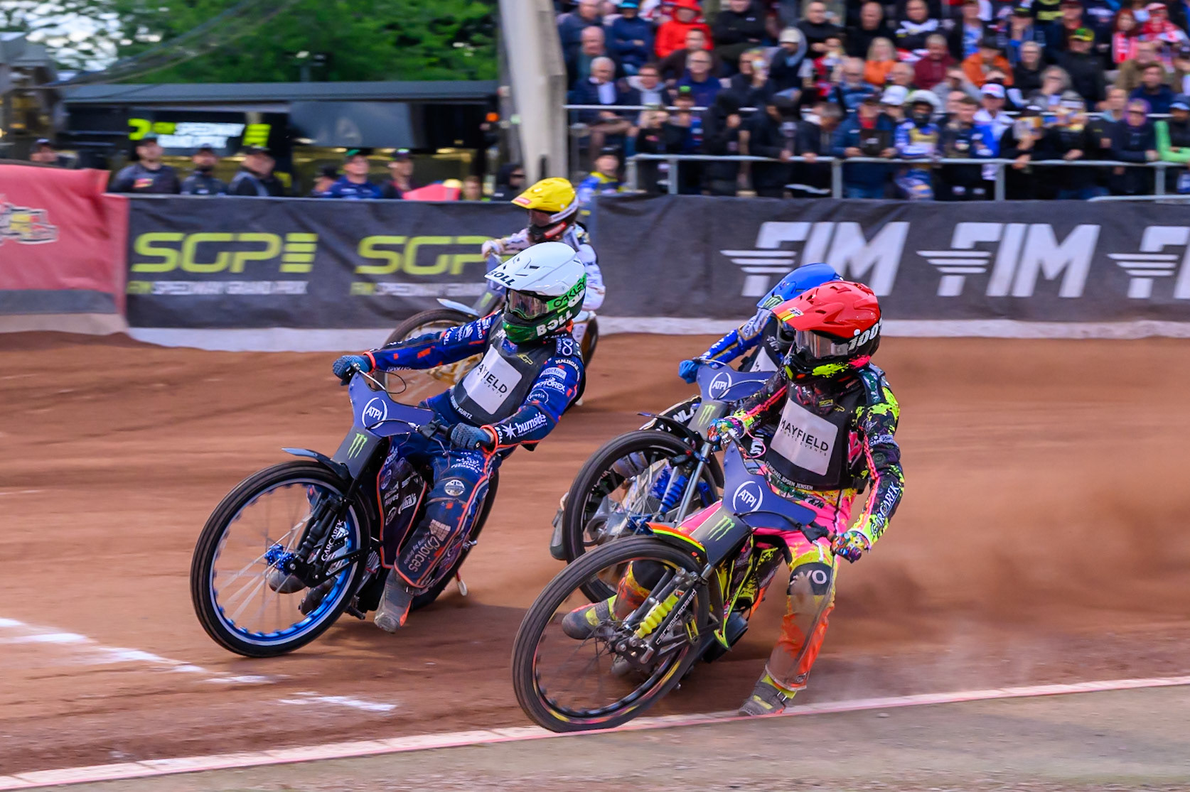 Brady Kurtz (101) of Australia in White leading Michael Jepsen Jensen (52) of Denmark in Red, Jack Holder (25) of Australia in Blue and Anders Thomsen (105) of Denmark in Yellow during the ATPI  FIM Speedway GP of Manchester at the National Speedway Stadium, Manchester on Friday 5th June 2026. (Photo: Ian Charles | MI News)