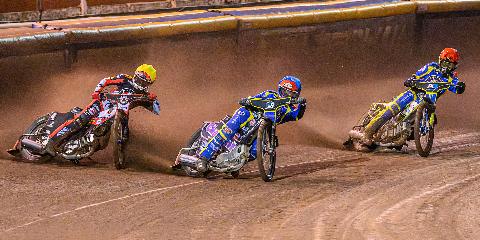 Leon Flint of Sheffield Tigers in Blue leading Zach Cook of Belle Vue Aces in Yellow  and Chris Holder of Sheffield Tigers in Red during the Rowe Motor Oil Premiership Grand Final 1st Leg match between Sheffield Tigers and Belle Vue Aces at Owlerton Stadium, Sheffield on Monday 12th October 2026. (Photo: Ian Charles | MI News)