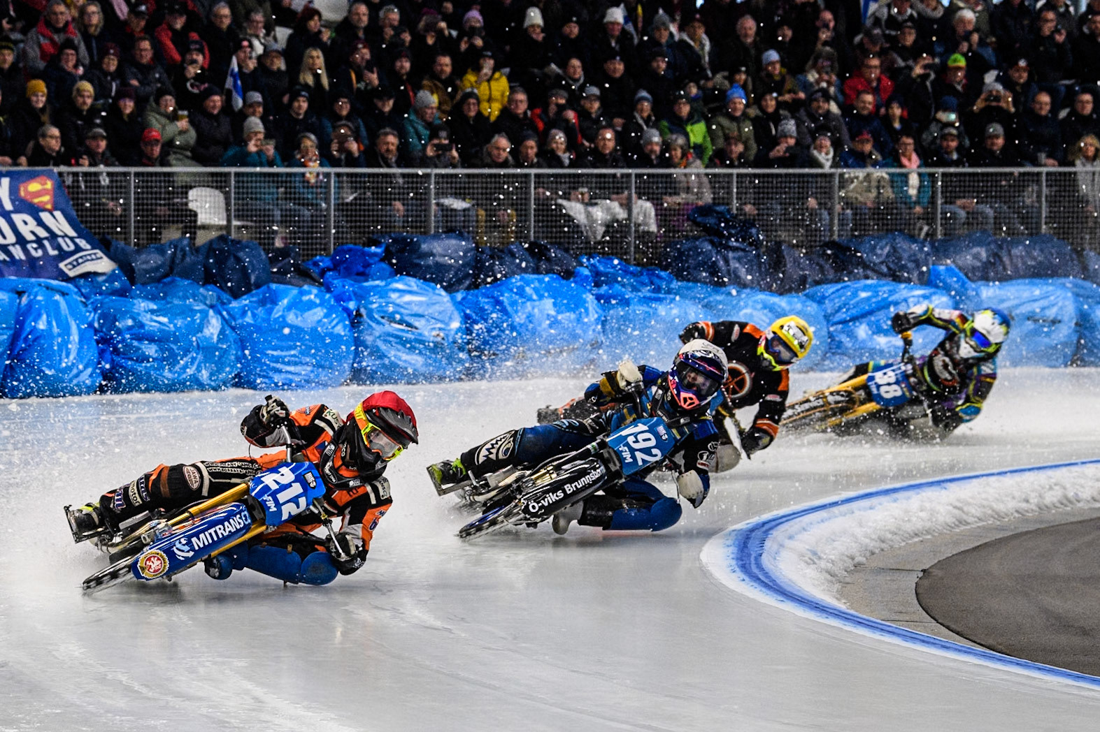 Lukas Hutla (212) of the Czech Republic in Red leading Niclas Svensson (192) of Sweden in White Sebastian Reitsma (125) of The Netherlands in Yellow and Maximilian Niedermaier (38) of Germany in Blue during the Ice Speedway Gladiators World Championship Final 2 at Max-Aicher-Arena, Inzell on Sunday 16th March 2025. (Photo: Ian Charles | MI News)