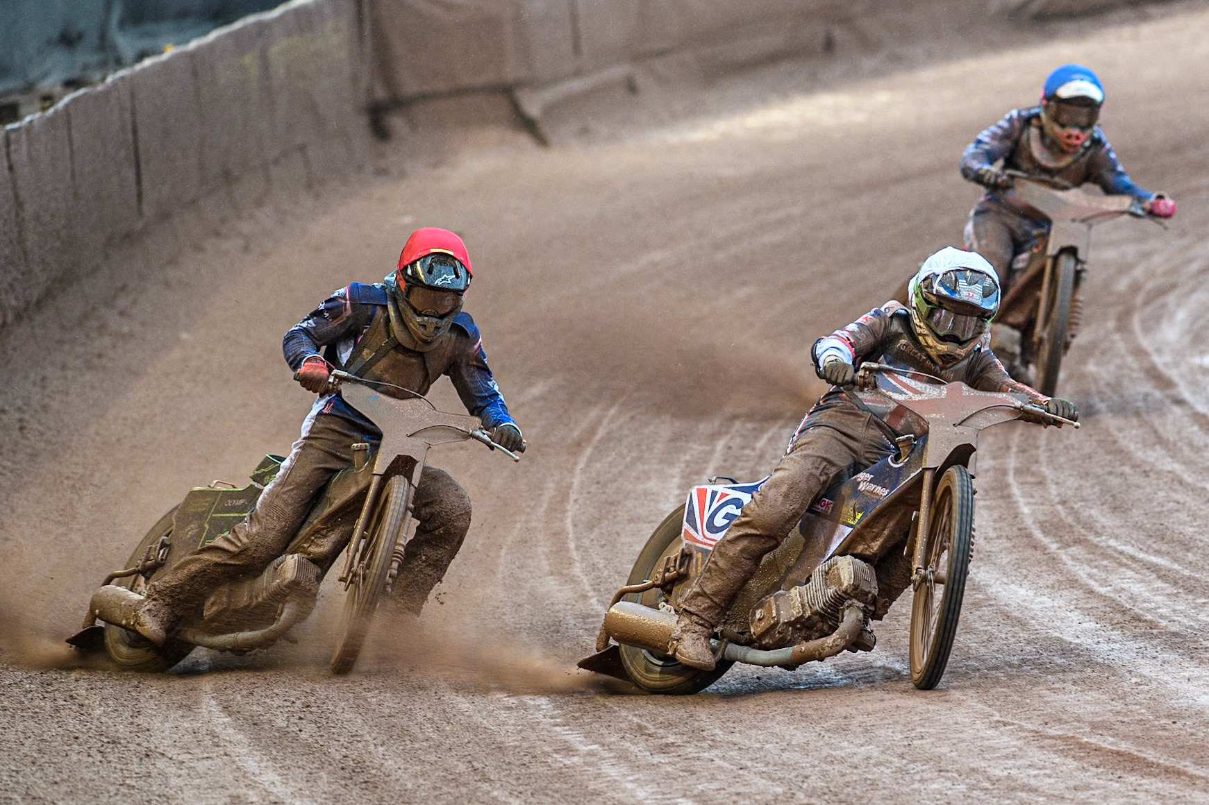 Leon Flint of Great Britain in White passes Jan Jenicek of Czech Republic in Red with Adam Bubba Bednar of Czech Republic in Blue behind during the Monster Energy FIM Speedway of Nations 2 (Under 21) Final at the National Speedway Stadium, Manchester on Friday 12th July 2024. (Photo: Ian Charles | MI News)