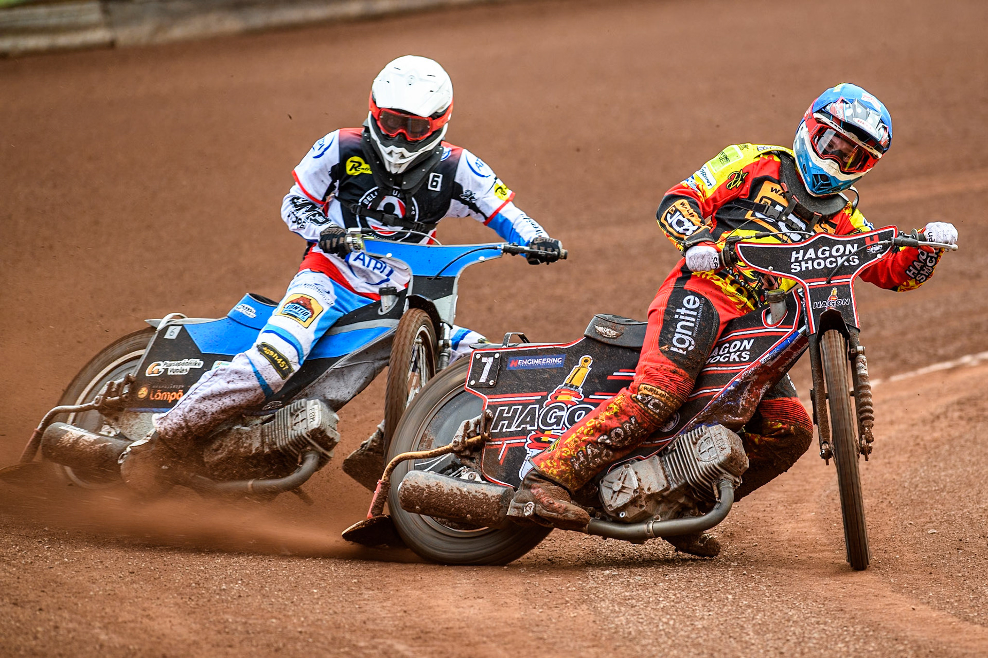 Leicester Lions' Sam Hagon in Blue leading Belle Vue Aces' Antti Vuolas in White during the Rowe Motor Oil Premiership match between Leicester Lions and Belle Vue Aces at the Pidcock Motorcycles Arena, Leicester on Thursday 25th July 2024. (Photo: Ian Charles | MI News)