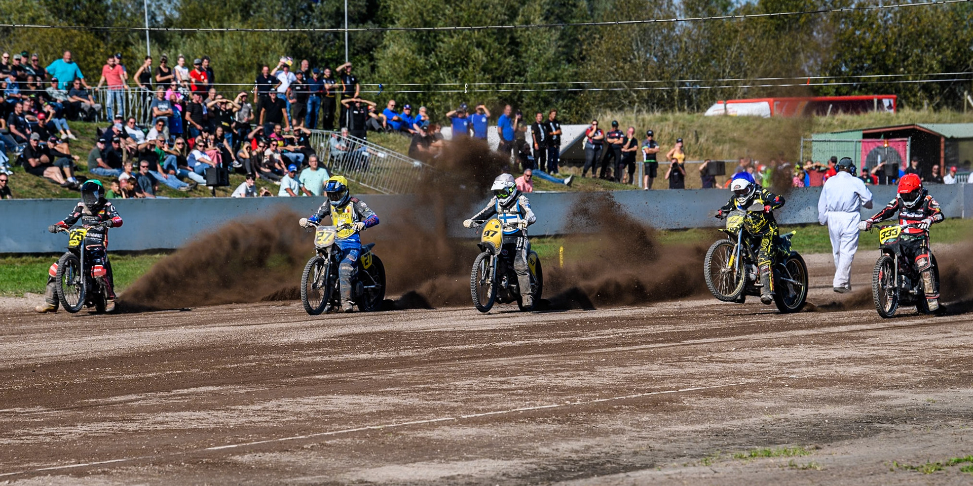 (L to R) Lukas Fienhage (125) of Germany in Green , \Mathias Trésarrieu (27) of France in Yellow, Henri Ahlbom (97) of Finland in White, Tero Aarnio (44) of Finland in Blue and Kenneth Kruse Hansen (333) of Denmark in Red leave the start during the FIM Long Track World Championship Final 5 at the Speed Centre Roden, Roden, Netherlands on Sunday 22nd September 2024. (Photo: Ian Charles | MI News)