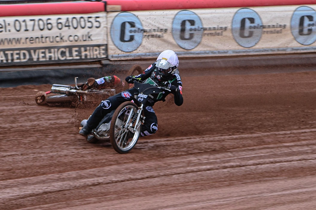 MANCHESTER, UK. APR 15TH  Jack Smith  slides off in the opening heat behind Dan Gilkes  during the National Development League match between Belle Vue Colts and Plymouth Centurions at the National Speedway Stadium, Manchester on Friday 15th April 2022. Credit: Ian Charles | MI News)
