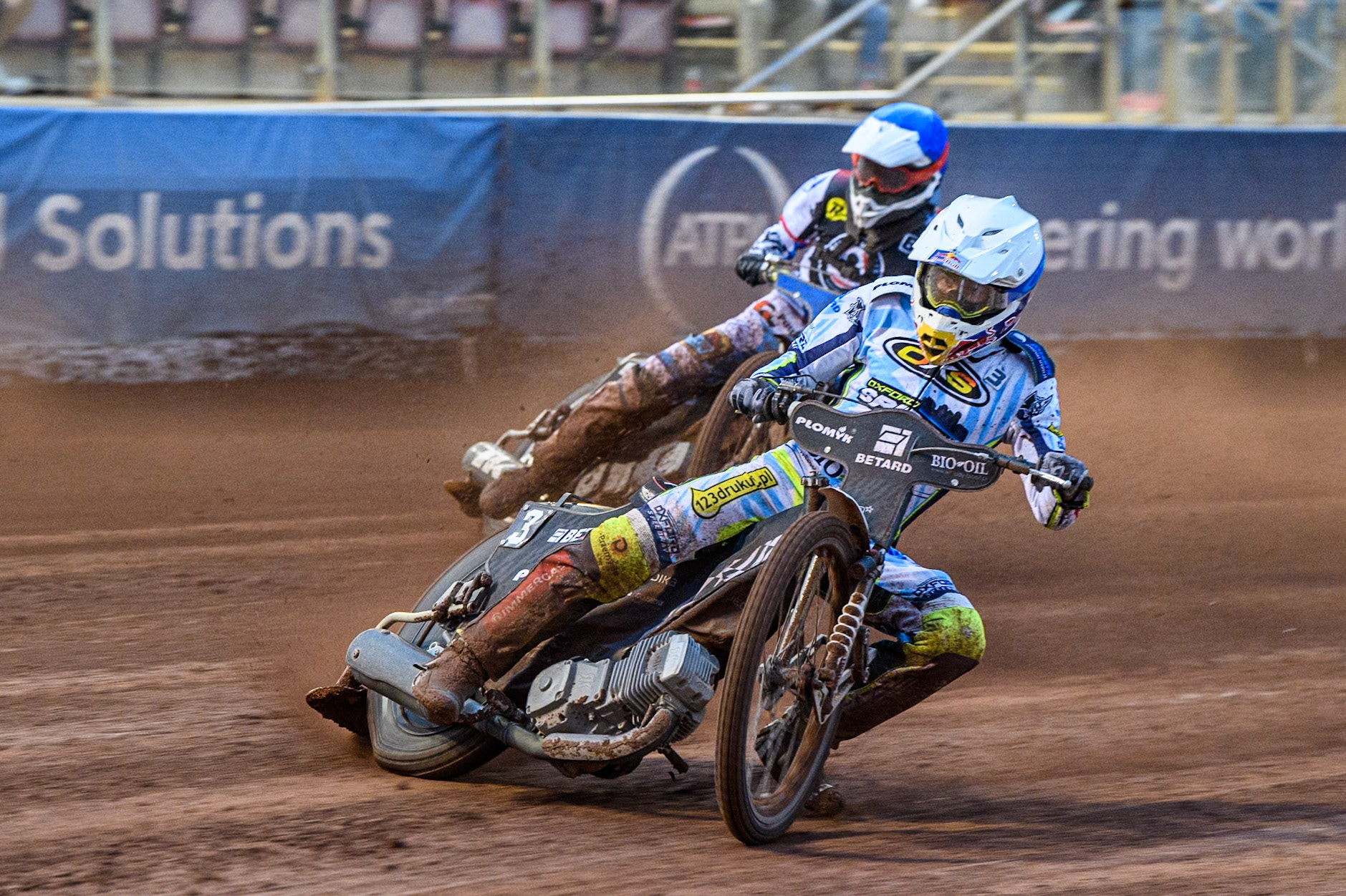 Oxford Spires' Maciej Janowski  in White leading Belle Vue Aces' guest Antti Vuolas  in Blue during the Rowe Motor Oil Premiership match between Belle Vue Aces and Oxford Spires at the National Speedway Stadium, Manchester on Monday 22nd July 2024. (Photo: Ian Charles | MI News)