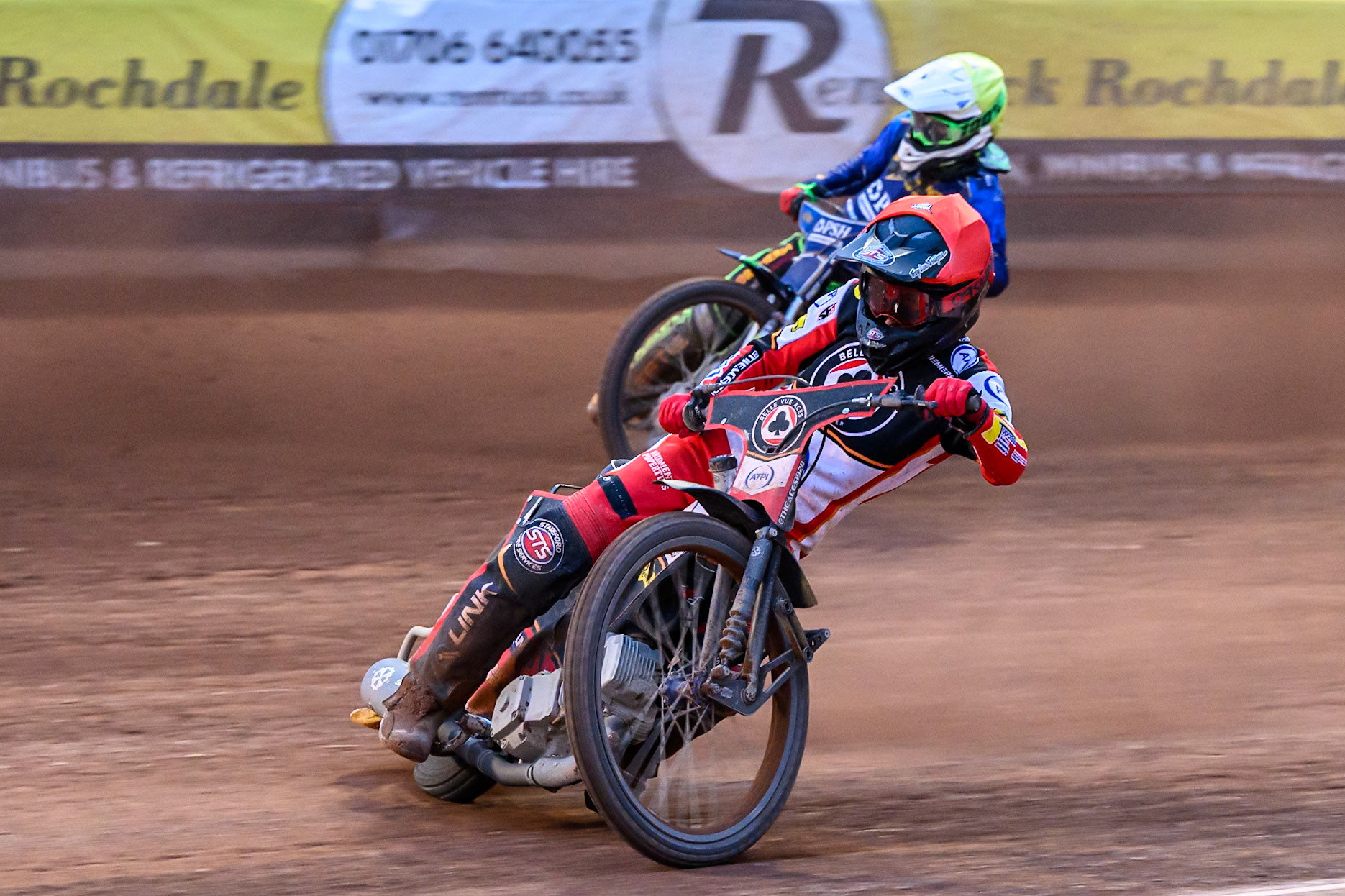 Belle Vue Aces' Zach Cook in Red leading Kings Lynn Stars' Guest Rider, Anders Rowe in Yellow during the Rowe Motor Oil Premiership match between Belle Vue Aces and King's Lynn Stars at the National Speedway Stadium, Manchester on Monday 23rd June 2025. (Photo: Ian Charles | MI News)