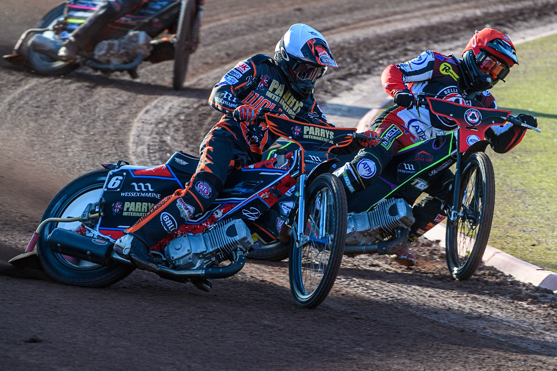 Zach Cook (White) outside Tom Brennan (Red) during the Sports Insure Premiership match between Belle Vue Aces and Wolverhampton Wolves at the National Speedway Stadium, Manchester on Monday 3rd July 2023. (Photo: Ian Charles | MI News)