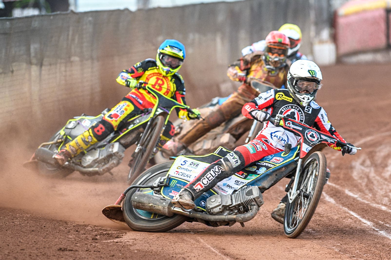 Belle Vue Aces' Jaimon Lidsey in White leading Birmingham Brummies' Tom Brennan in Blue, Birmingham Brummies' Freddie Lindgren in Red and Belle Vue Aces' Norick Blodorn in Yellow during the Rowe Motor Oil Premiership match between Birmingham Brummies and Belle Vue Aces at Perry Bar Stadium, Birmingham on Monday 29th July 2024. (Photo: Ian Charles | MI News)