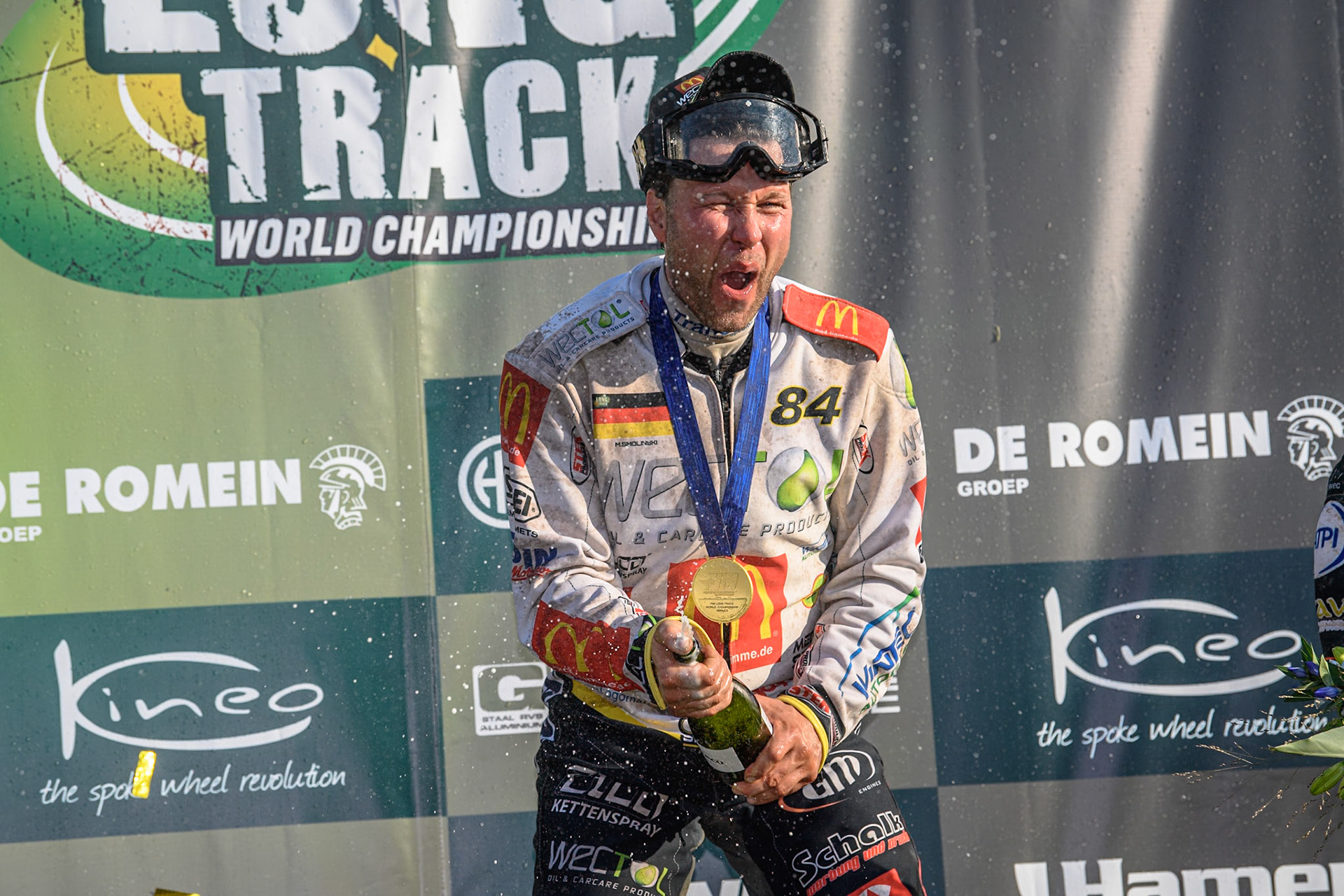 Martin Smolinski (84) of Germany sprays the Champagne during the FIM Long Track World Championship Final 5 at the Speed Centre Roden, Roden, Netherlands on Sunday 22nd September 2024. (Photo: Ian Charles | MI News)