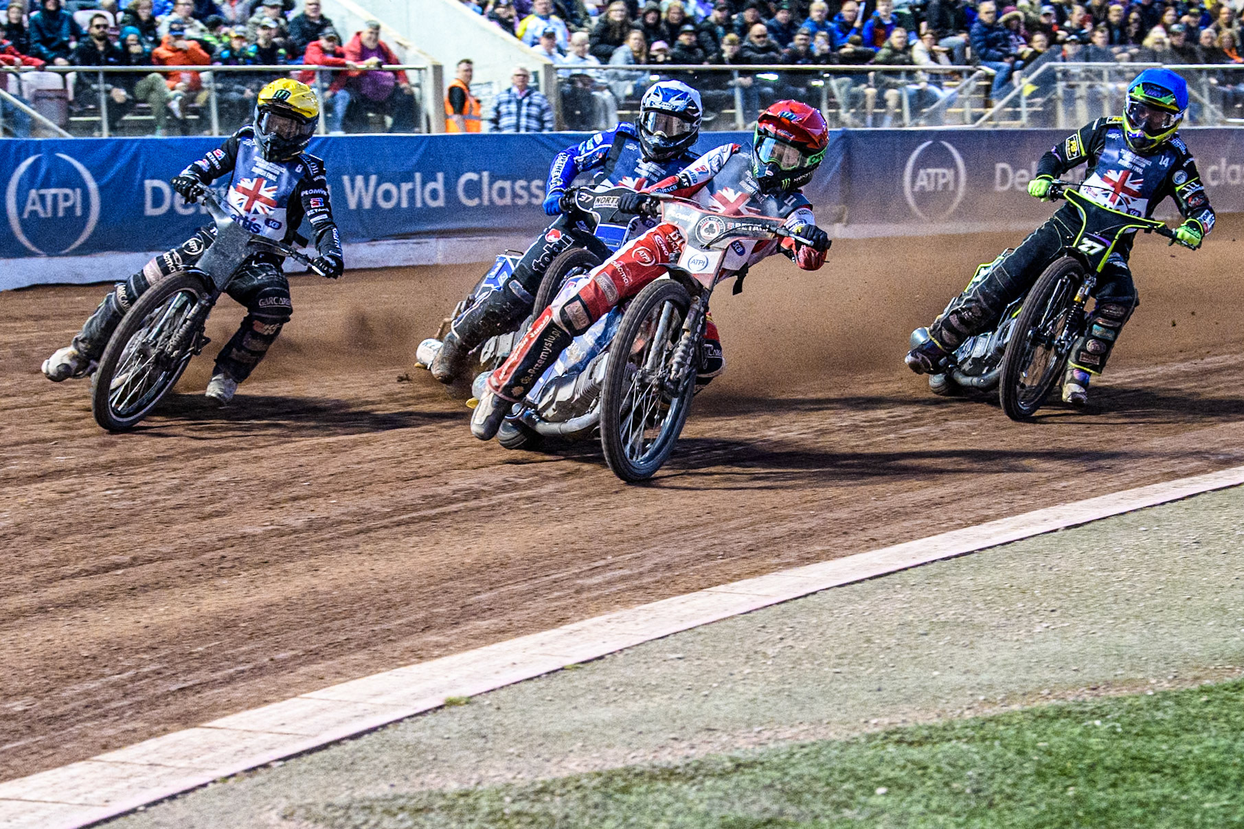 The final: Dan Bewley in Red leading Tai Woffinden in Yellow, Chris Harris in White and Tom Brennan in Blue during the Attis Insurance Sports Division British Speedway Championship Final at the National Speedway Stadium, Manchester on Saturday 8th June 2024. (Photo: Ian Charles | MI News)