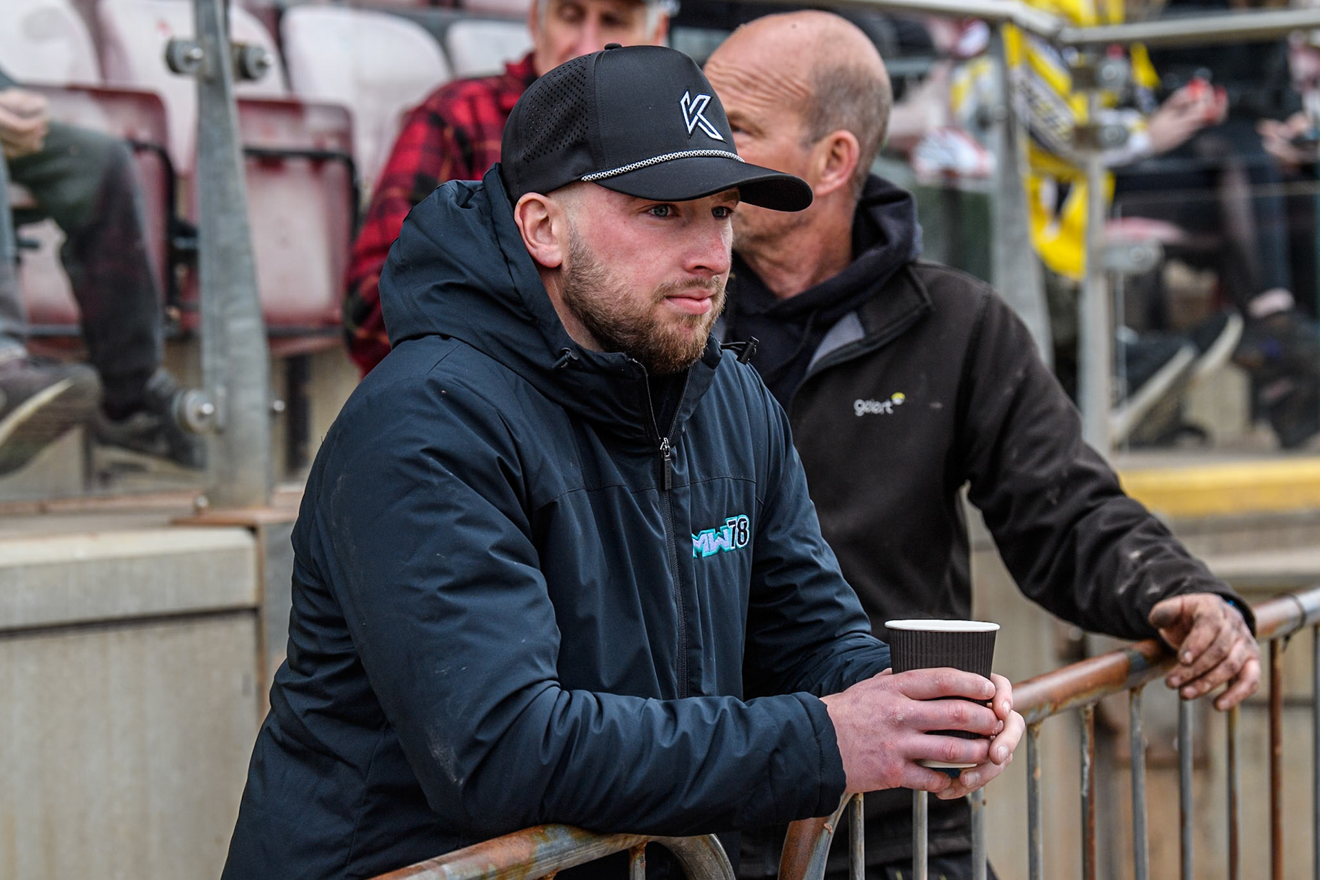 Belle Vue Colts’ Mason Watson watches the racing as he has a broken wrist and unable to ride  during the WSRA National Development League match between Belle Vue Colts and Leicester Lion Cubs at the National Speedway Stadium, Manchester on Friday 18th April 2025. (Photo: Ian Charles | MI News)