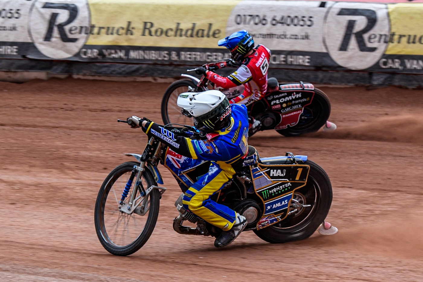 Jack Holder of Sheffield Tigers in White rides inside Dan Bewley of Belle Vue Aces in Blue during the Rowe Motor Oil Premiership match between Belle Vue Aces and Sheffield Tigers at the National Speedway Stadium, Manchester on Monday 5th May 2025. (Photo: Ian Charles | MI News)
