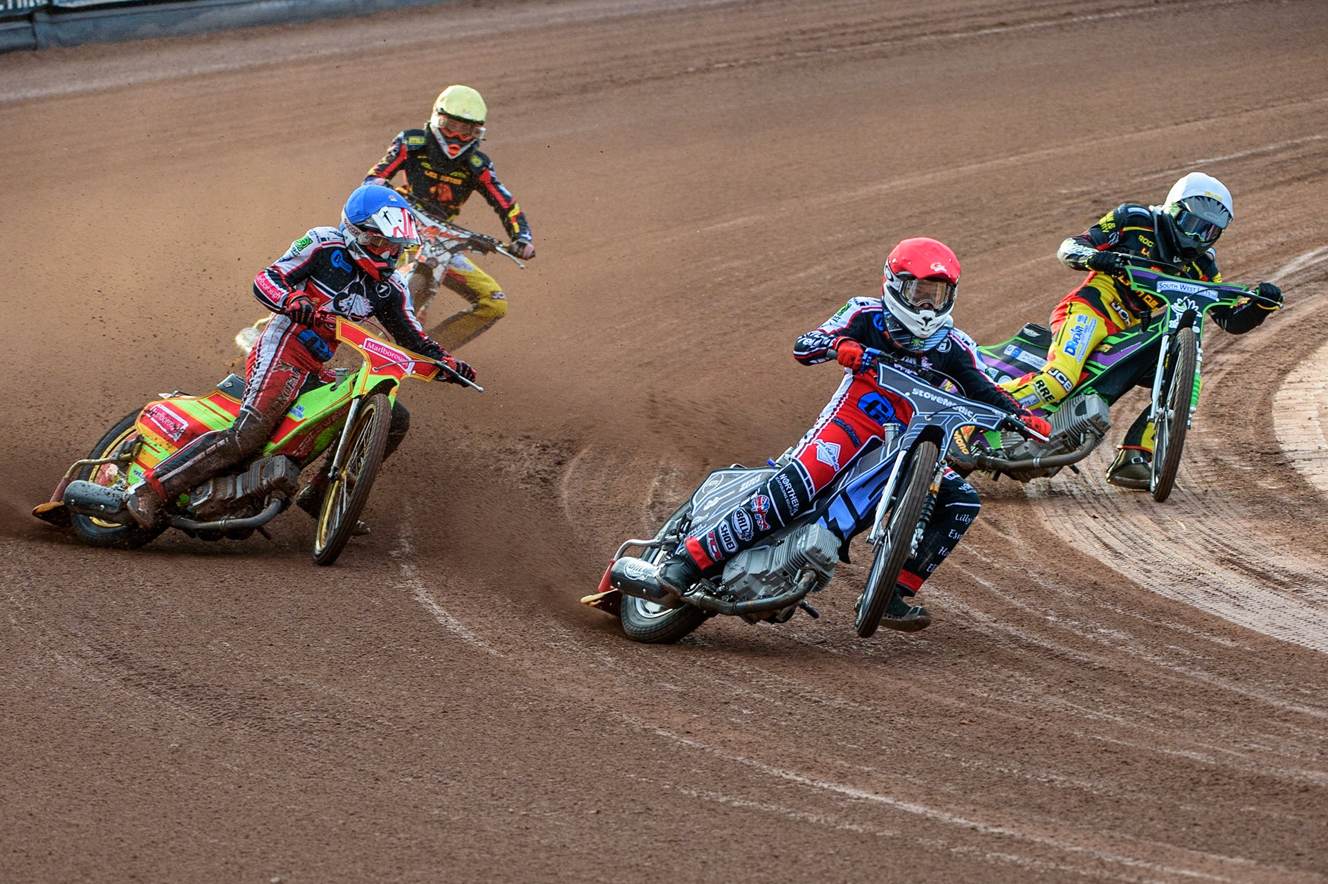 MANCHESTER, UK. JULY 29TH  Sam McGurk  (Red) leads Ben Woodhull  (Blue) Kai Ward  (White) and Mickie Simpson   (Yellow) during the National Development League match between Belle Vue Colts and Leicester Lion Cubs at the National Speedway Stadium, Manchester on Thursday 29th July 2021. (Credit: Ian Charles | MI News)