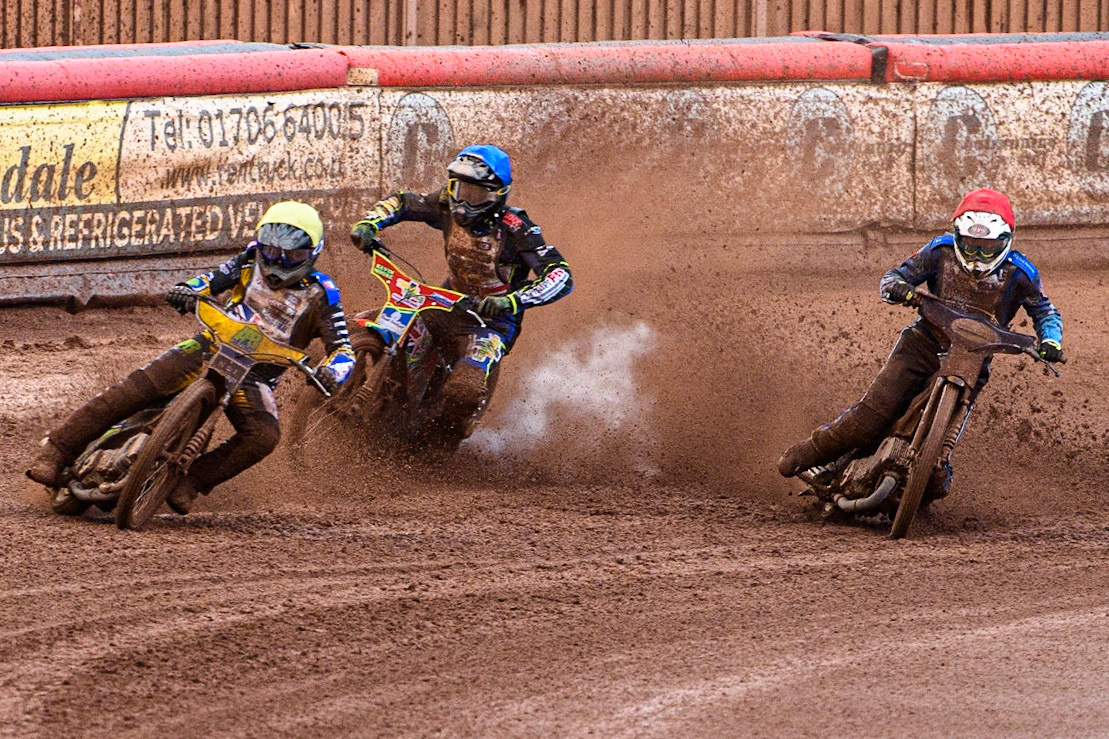 Ben Barker (Yellow) leads as Richard Lawson (Red) and Simon Lambert (Blue) struggle on the heavy track during the Sports Insure British Speedway Final at the National Speedway Stadium, Manchester on Monday 14th August 2023. (Photo: Ian Charles | MI News)