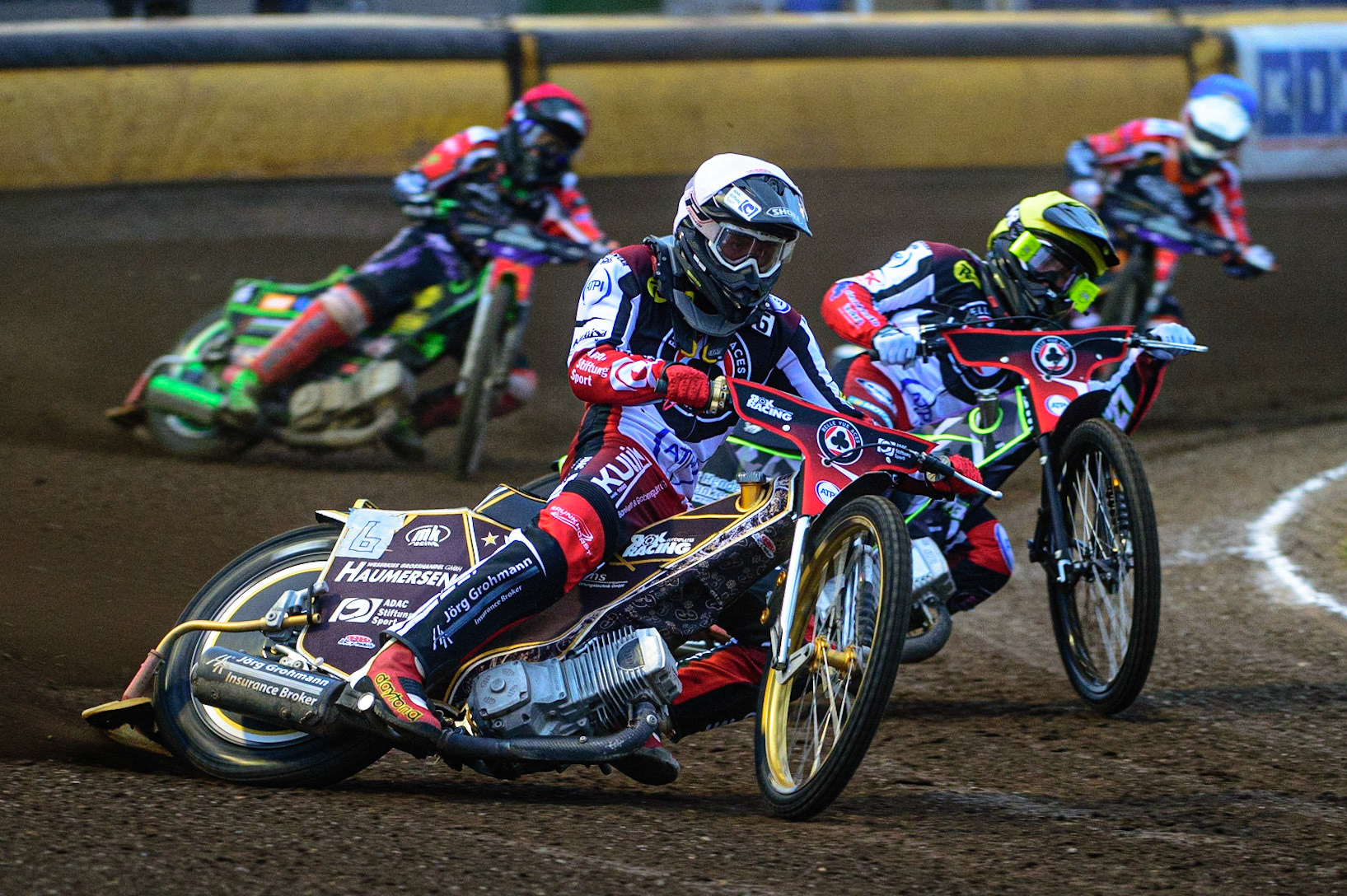 PETERBOROUGH, UK. MAY 9TH  Norick Blödorn (White) and Tom Brennan (Yellow) take maximum points for The Aces ahead of Benjamin Basso  (Red) and Jordan Palin  (Blue) during the SGB Premiership match between Peterborough Panthers and Belle Vue Aces at East of England Showground, Peterborough on Monday 9th May 2022. (Credit: Ian Charles | MI News)