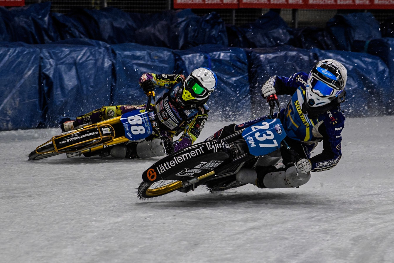 Sweden's Jimmy Hörnell Lidfalk (237) (White) picks up some grip ahead of Germany's Max Niedermaier (88) (Blue) during the FIM Ice Speedway Gladiators World Championship Final 1 at the Max-Aicher-Arena, Inzell on Saturday 23 March 2024. (Photo: Ian Charles | MI News)