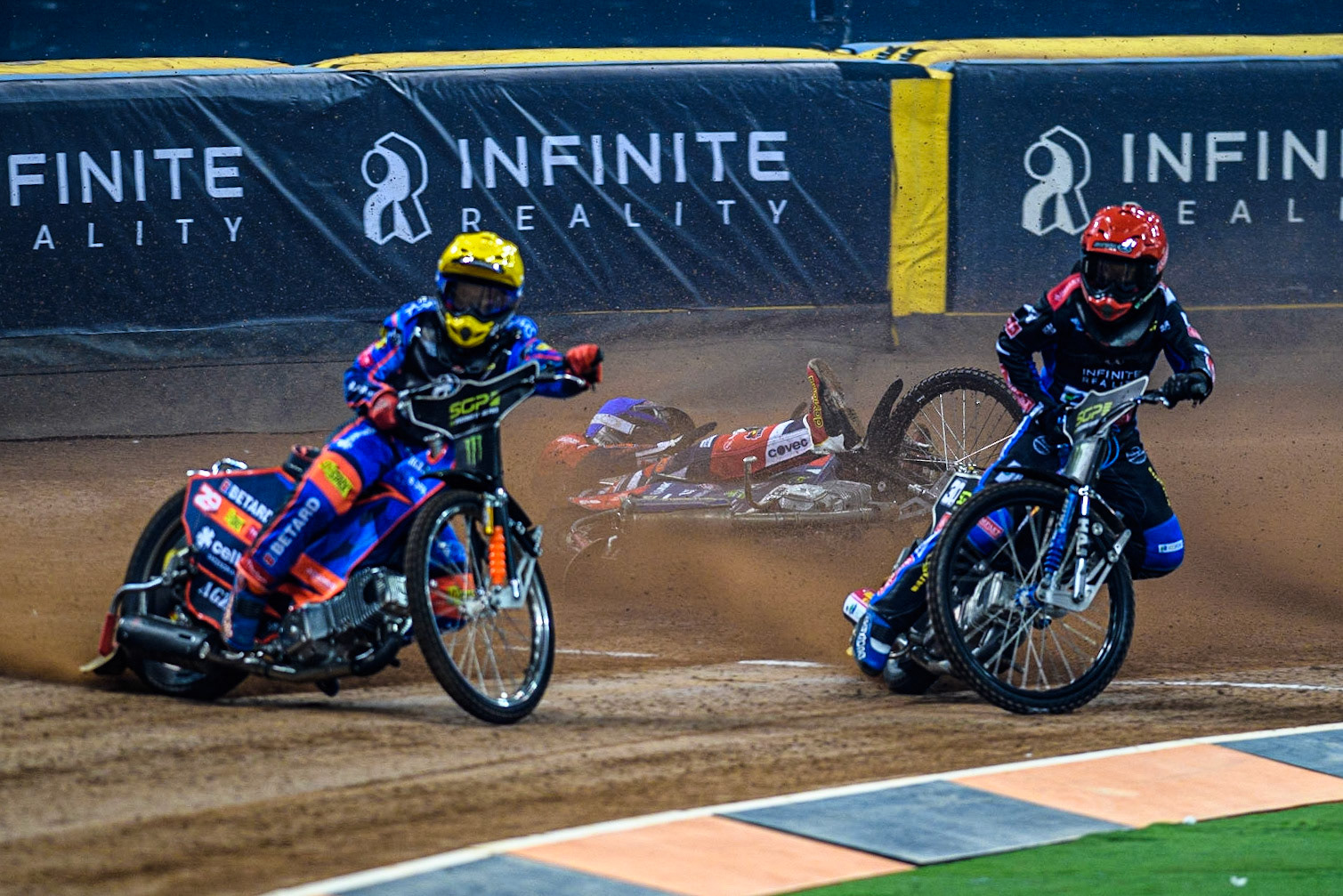 Steve Worrall (16) is a faller behind Leon Madsen (30) (Red)and Andzejs Lebedevs (29) (Yellow)during the FIM Speedway Grand Prix of Great Britain at the Principality Stadium, Cardiff on Saturday 2nd September 2023. (Photo: Ian Charles | MI News)