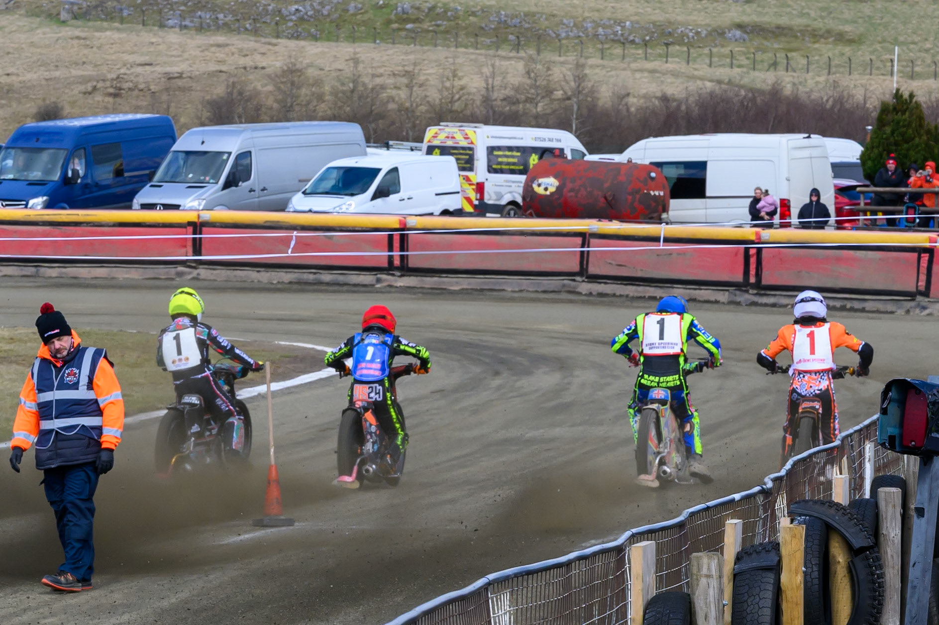 The riders leave the start in the opening heat (L to R) Alfie Bowtell of 'The Wolves' in Yellow, Jack Smith of Buxton Bulls  in Red, Simon Lambert of 'The Potters' in Blue and Mickie Simpson of 'The Kings' in White during the Regina Chains Fours at Buxton Speedway, Buxton on Sunday 5th April 2026. (Photo: Ian Charles | MI News)