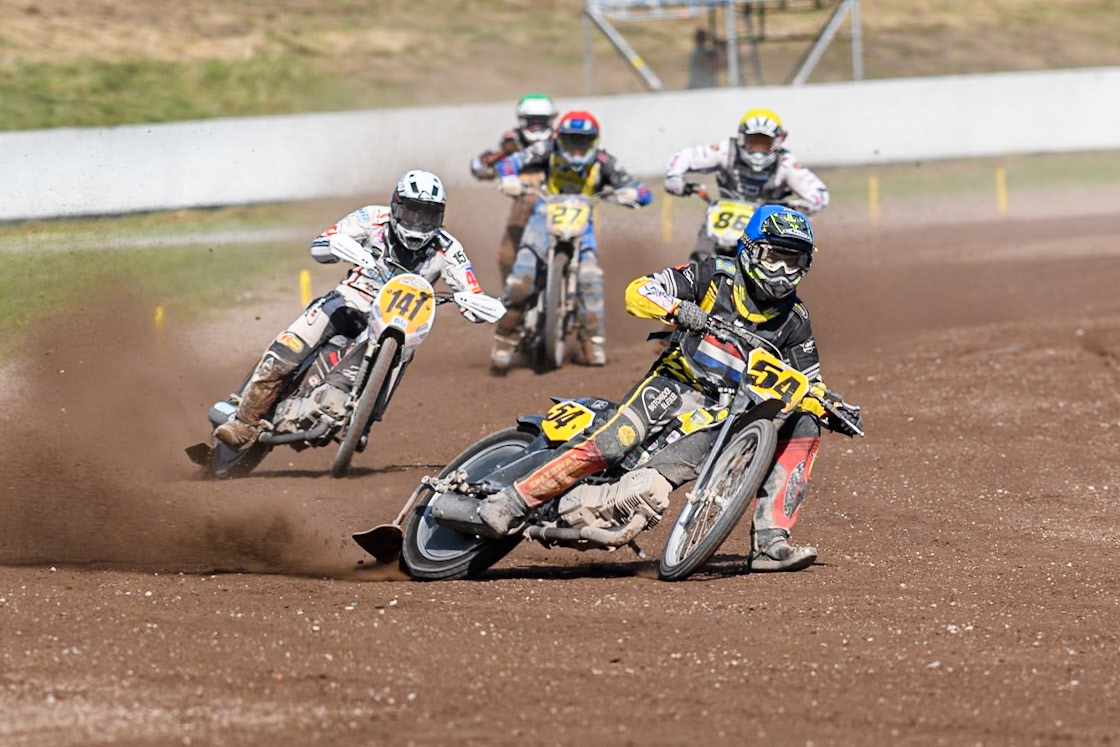 Mika Meijer (54) of The Netherlands in Blue leading Andrew Appleton (141) of Great Britain in White, \Hynek Stichauer (86) of Czech Republic  in Yellow Mathias Trésarrieu (27) of France in Red and Henry van der Steen (15) of The Netherlands in Green  during the FIM Long Track World Championship Final 5 at the Speed Centre Roden, Roden, Netherlands on Sunday 22nd September 2024. (Photo: Ian Charles | MI News)