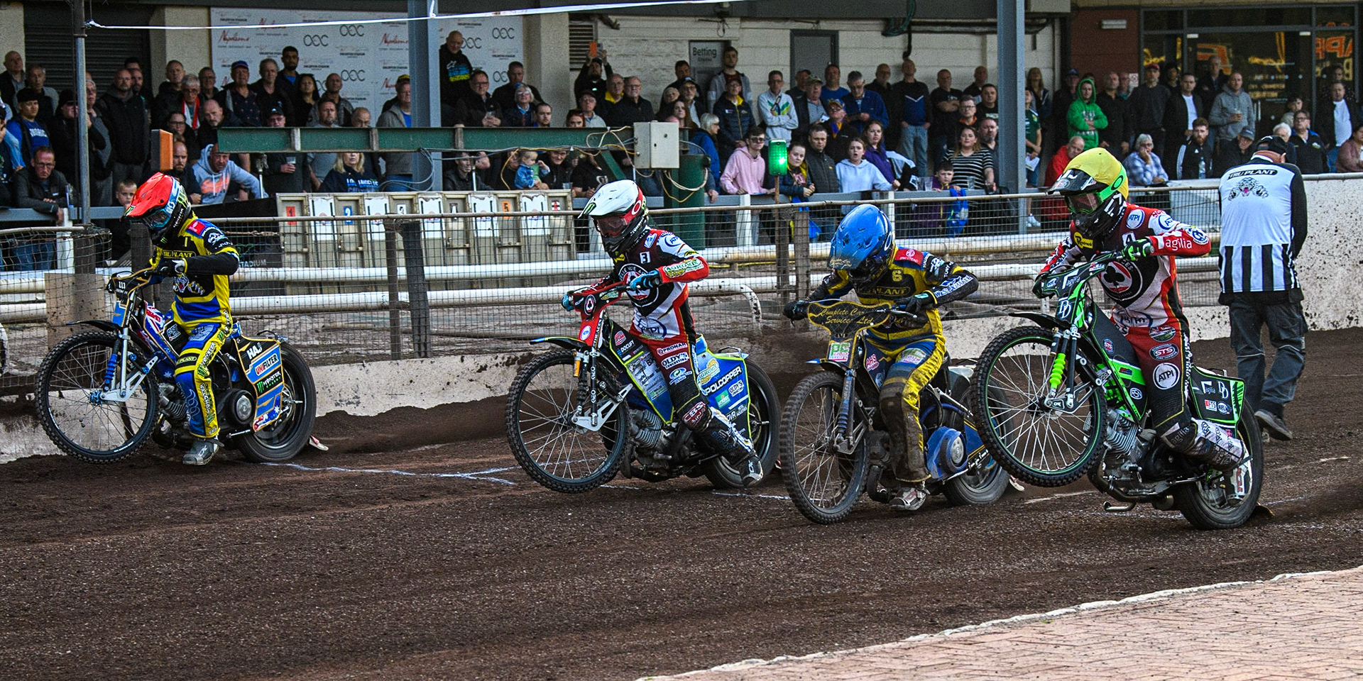 (l - r) Jack Holder (Red), Jaimon Lidsey (White) Kyle Howarth (Blue) and Charles Wright (Yellow) leave the start during the Sports Insure Premiership match between Sheffield Tigers and Belle Vue Aces at Owlerton Stadium, Sheffield on Thursday 20th July 2023. (Photo: Ian Charles | MI News)