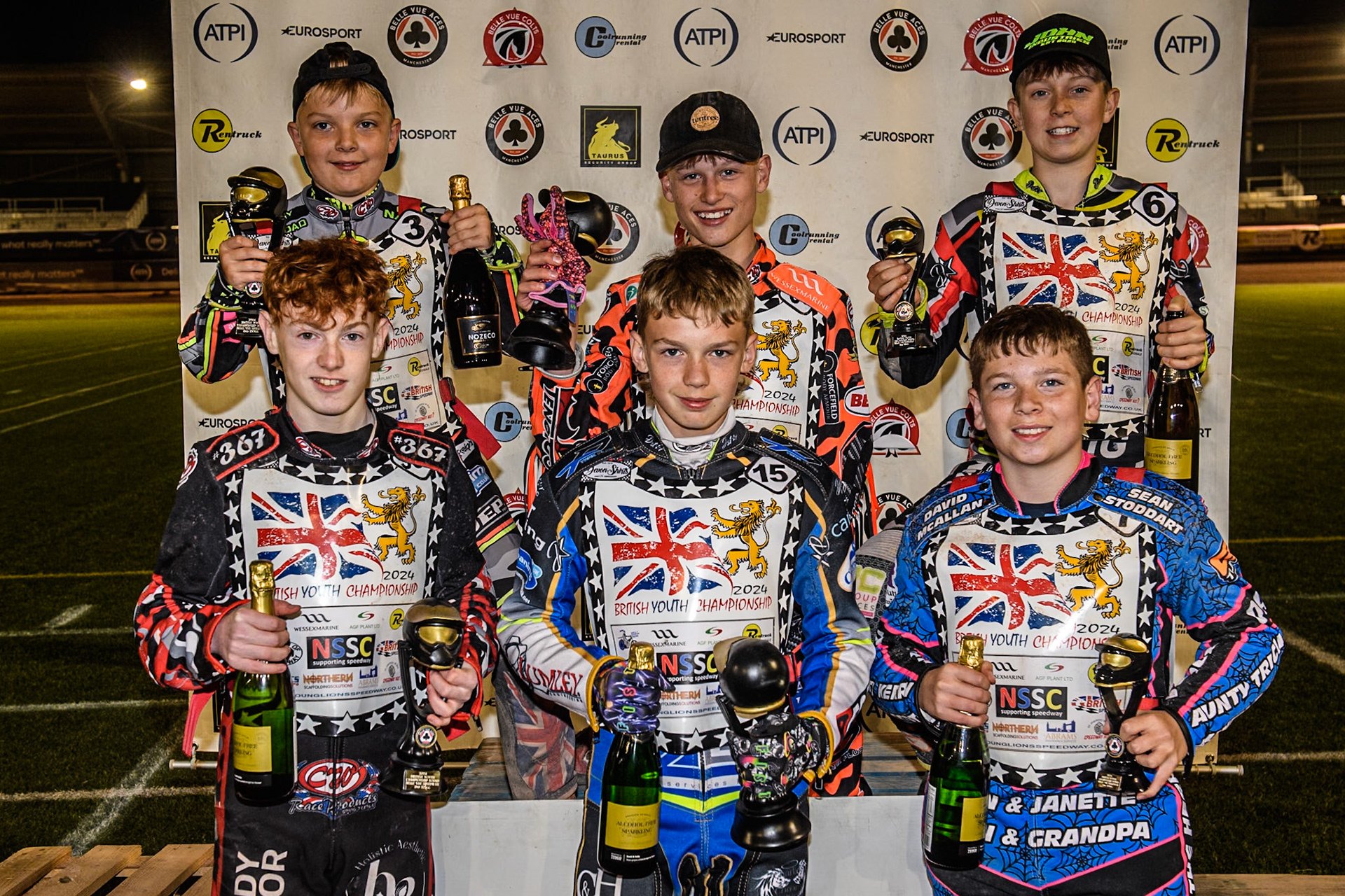 Rear: (L to R) 250cc riders: Archie Rolph (2nd), Cooper Rushen (Winner), Seth Norman (3rd).Front: (L to R) 125cc Riders: Charlie Luckman (2nd) Oliver Bovingdon (Winner) Rocco Webb (3rd) during the British Youth 250cc Championships at the National Speedway Stadium, Manchester on Friday 30th August 2024. (Photo: Ian Charles | MI News)