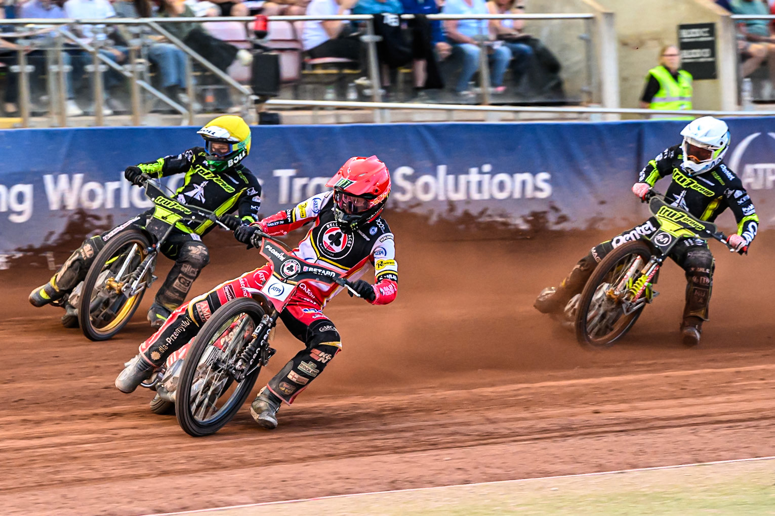 Belle Vue Aces' Dan Bewley  in Red leading Ipswich Witches' Jason Doyle  in Yellow and Ipswich Witches' Emil Saifutdinov  in White during the Rowe Motor Oil Premiership match between Belle Vue Aces and Ipswich Witches at the National Speedway Stadium, Manchester on Monday 30th June 2025. (Photo: Ian Charles | MI News)