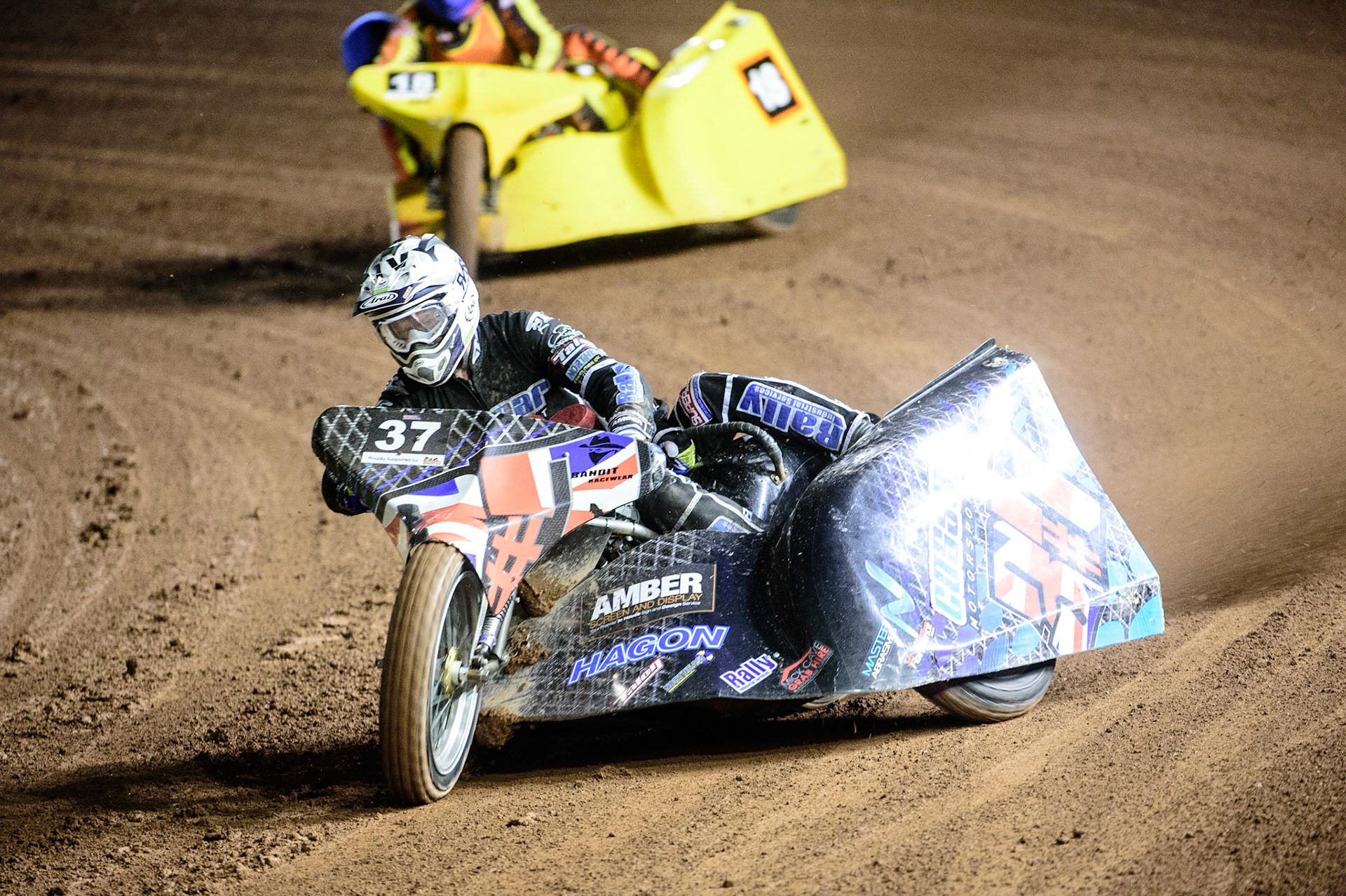 MANCHESTER, UK. OCT 30TH   Mark Cossar &amp; Gareth Williams  (White) leads Mick Stace &amp; Ryan Knowles (Blue) during the Manchester Masters Sidecar Speedway and Flat Track Racing at the National Speedway Stadium, Manchester on Saturday 30th October 2021. (Credit: Ian Charles | MI News)