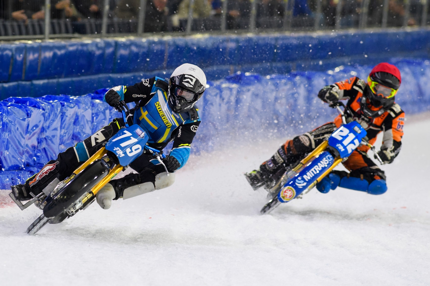 Filip Jäger (719) of Sweden in White leading Lukas Hutla (212) of the Czech Republic in Red during the FIM Ice Speedway Gladiators World Championship, Final 3 at the Ice Stadium, Thialf, Heerenveen on Saturday 5th April 2025. (Photo: Ian Charles | MI News)