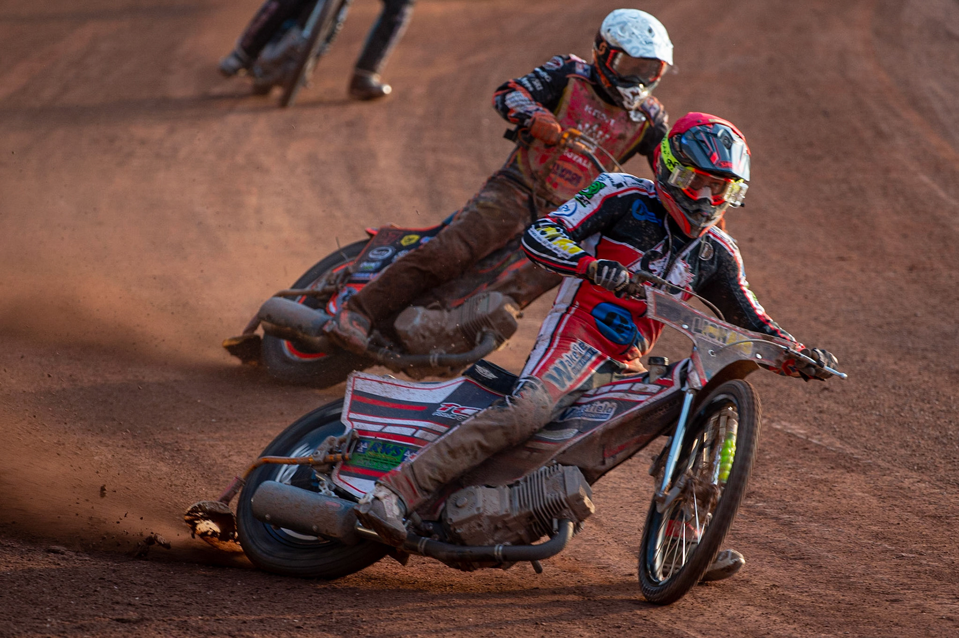 MANCHESTER, UK. JULY 2ND  Jack Parkinson-Blackburn  (Red) leads Alex Spooner  (White)during the National Development League match between Belle Vue Colts and Kent Royals at the National Speedway Stadium, Manchester on Friday 2nd July 2021. (Credit: Ian Charles | MI News)