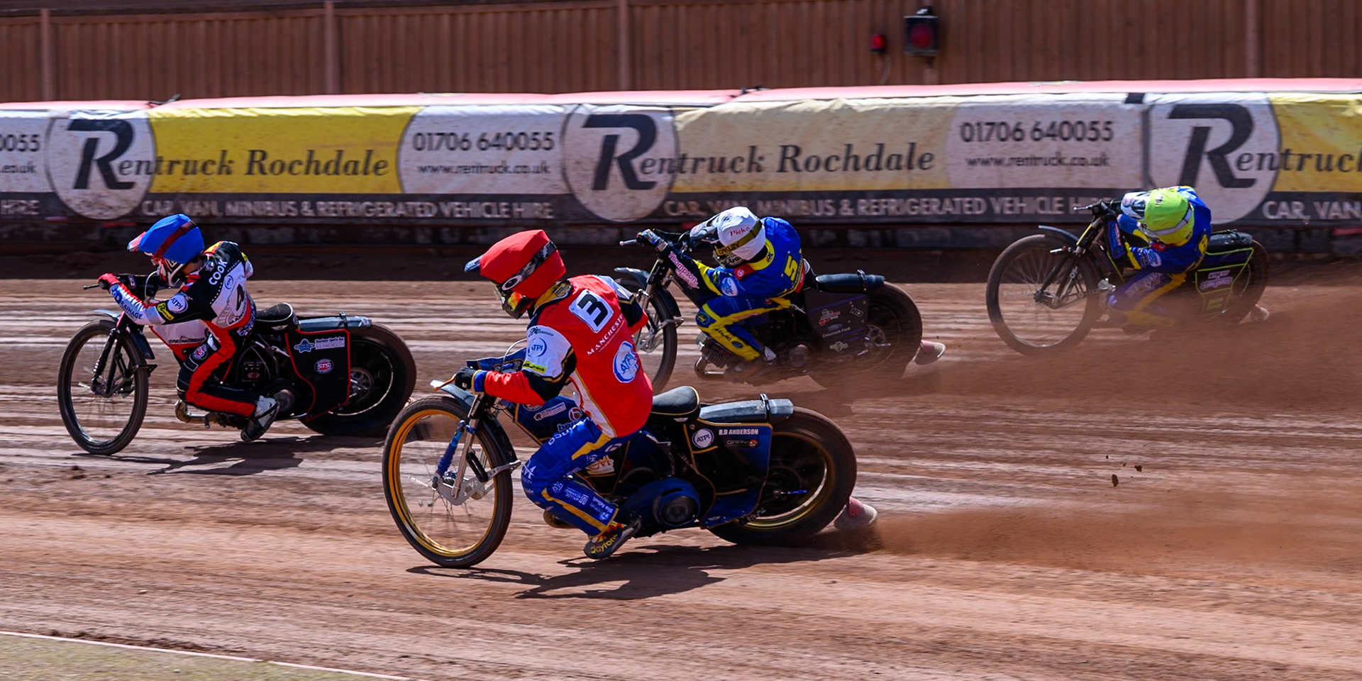 Justin Sedgman, Guest Rider for Belle Vue Aces in Red chases Zach Cook of Belle Vue Aces in Blue Josh Pickering of Sheffield Tigers in White and Jye Etheridge of Sheffield Tigers  in Yellow during the Rowe Motor Oil Premiership match between Belle Vue Aces and Sheffield Tigers at the National Speedway Stadium, Manchester on Monday 25th May 2026. (Photo: Ian Charles | MI News)