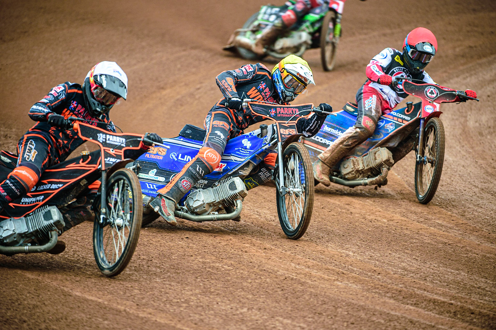 Brady Kurtz  (Red) inside Steve Worrall  (Yellow) and Sam Masters  (White) during the SGB Premiership match between Belle Vue Aces and Wolverhampton Wolves at the National Speedway Stadium, Manchester on Monday 29th August 2022. (Credit: Ian Charles | MI News)