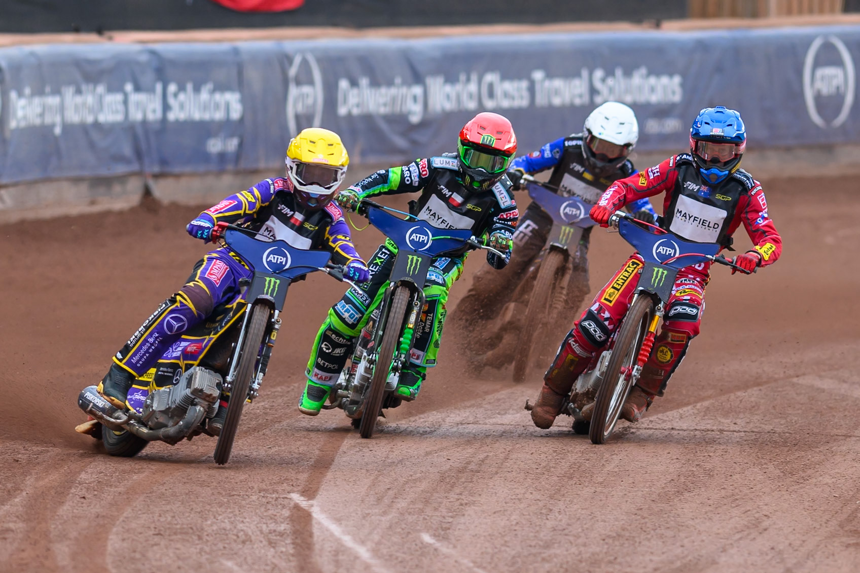 Kacper Woryna (223) of Poland in Yellow leading Patryk Dudek (692) of Poland in Red Max Fricke (46) of Australia in Blue and Nazar Parnitskyi (785) of Ukraine in White during the ATPI  FIM Speedway GP of Manchester at the National Speedway Stadium, Manchester on Saturday 6th June 2026. (Photo: Ian Charles | MI News)