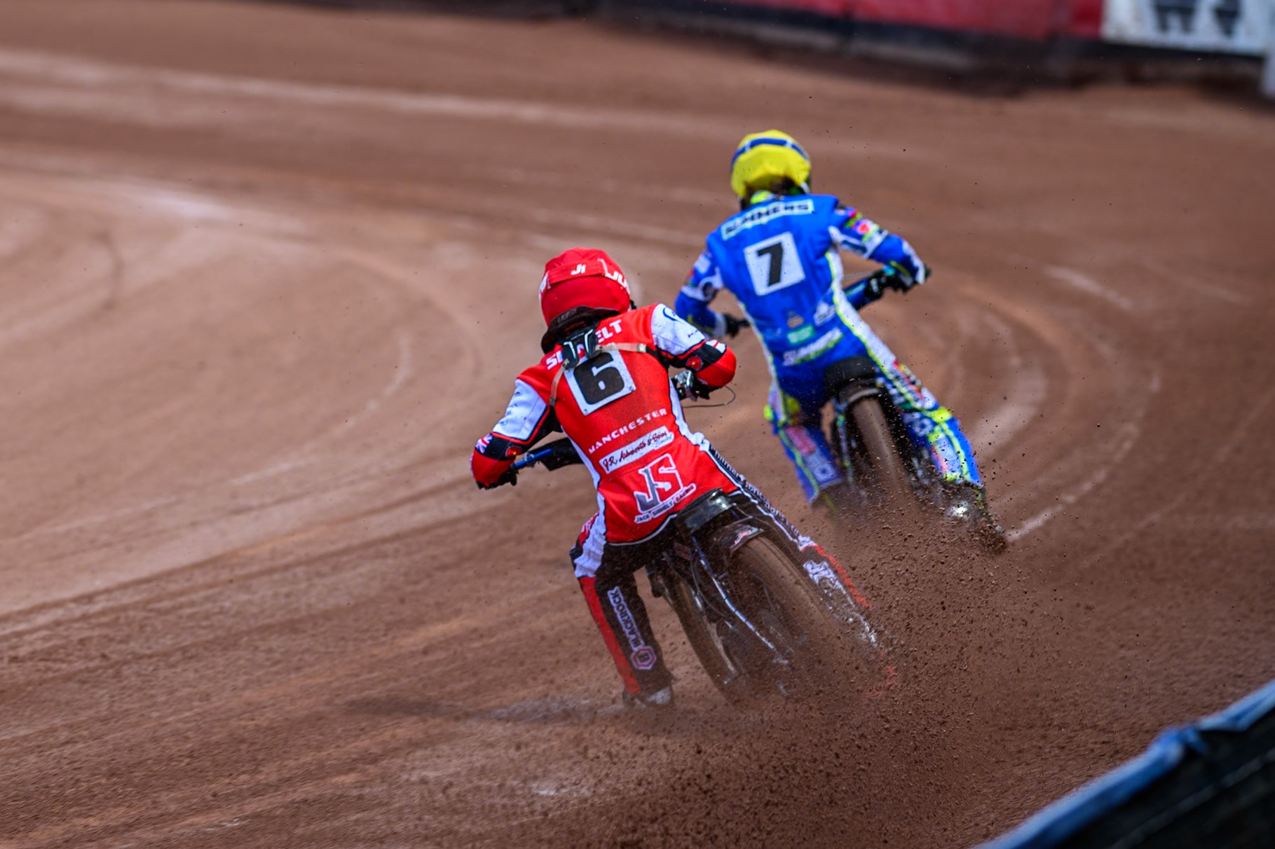 Belle Vue Colts' Jack Shimelt  in Red chases Oxford Chargers' Senna Summers  in Yellow during the WSRA National Development League match between Belle Vue Colts and Oxford Chargers at the National Speedway Stadium, Manchester on Sunday 1st June 2025. (Photo: Ian Charles | MI News)