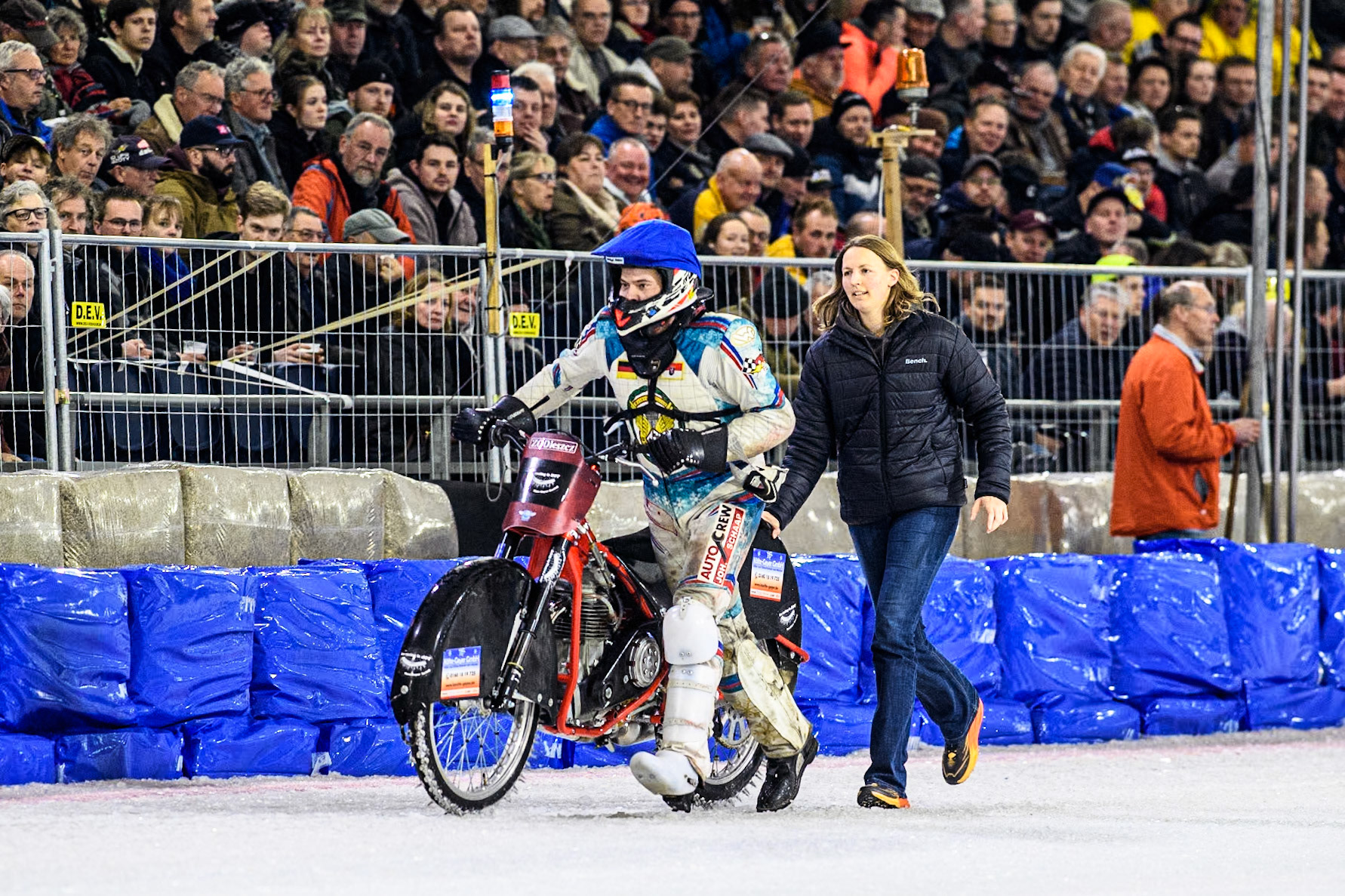 Marc Geyer of Germany pushes his bike back to the pits after his fall during the Roelof Thijs Bokaal at Ice Rink Thialf, Heerenveen, The Netherlands on Friday 5th April 2024. (Photo: Ian Charles | MI News)
