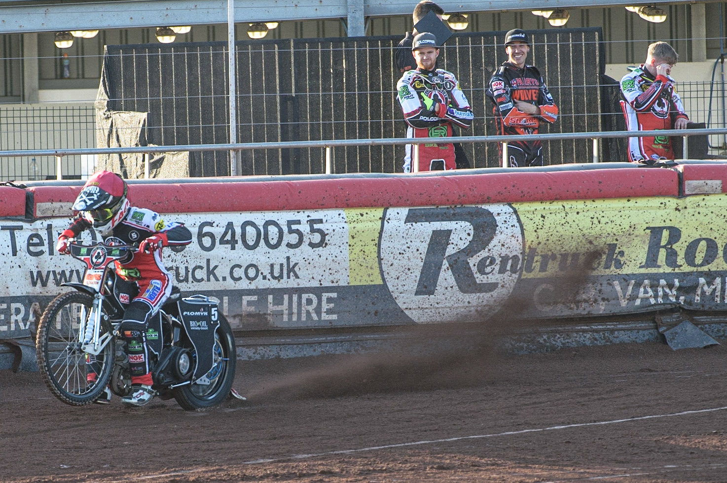 MANCHESTER, UK. JULY 15TH   Dan Bewley  (Red) tries a practice start watched by Brady Kurtz  (left) and Sam Masters, whist Tom Brennan (right)  tries to avoid the dirt   during the SGB Premiership match between Belle Vue Aces and Wolverhampton Wolves at the National Speedway Stadium, Manchester on Thursday 15th July 2021. (Credit: Ian Charles | MI News)