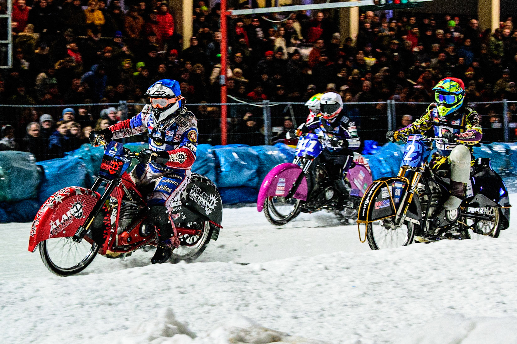 Jan Klatovsky (Blue) leads Maximillian Neidermaier (Red) Benedikt Monn (White) and Niek Schaap (Yellow) during the German Individual Ice Speedway Championship at Horst-Dohm-Eisstadion, Berlin on Friday 3rd March 2023. (Photo: Ian Charles | MI News)