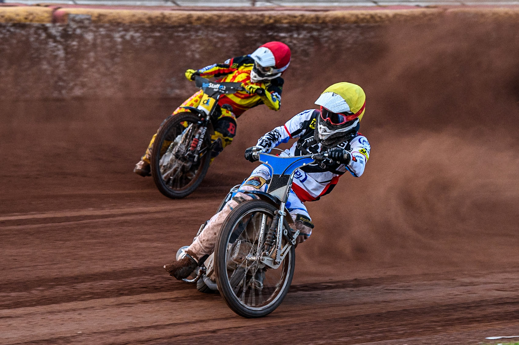 Belle Vue Aces' Antti Vuolas in Yellow leading Birmingham Brummies' Wiktor Lampart in Red during the Rowe Motor Oil Premiership match between Birmingham Brummies and Belle Vue Aces at Perry Bar Stadium, Birmingham on Monday 29th July 2024. (Photo: Ian Charles | MI News)