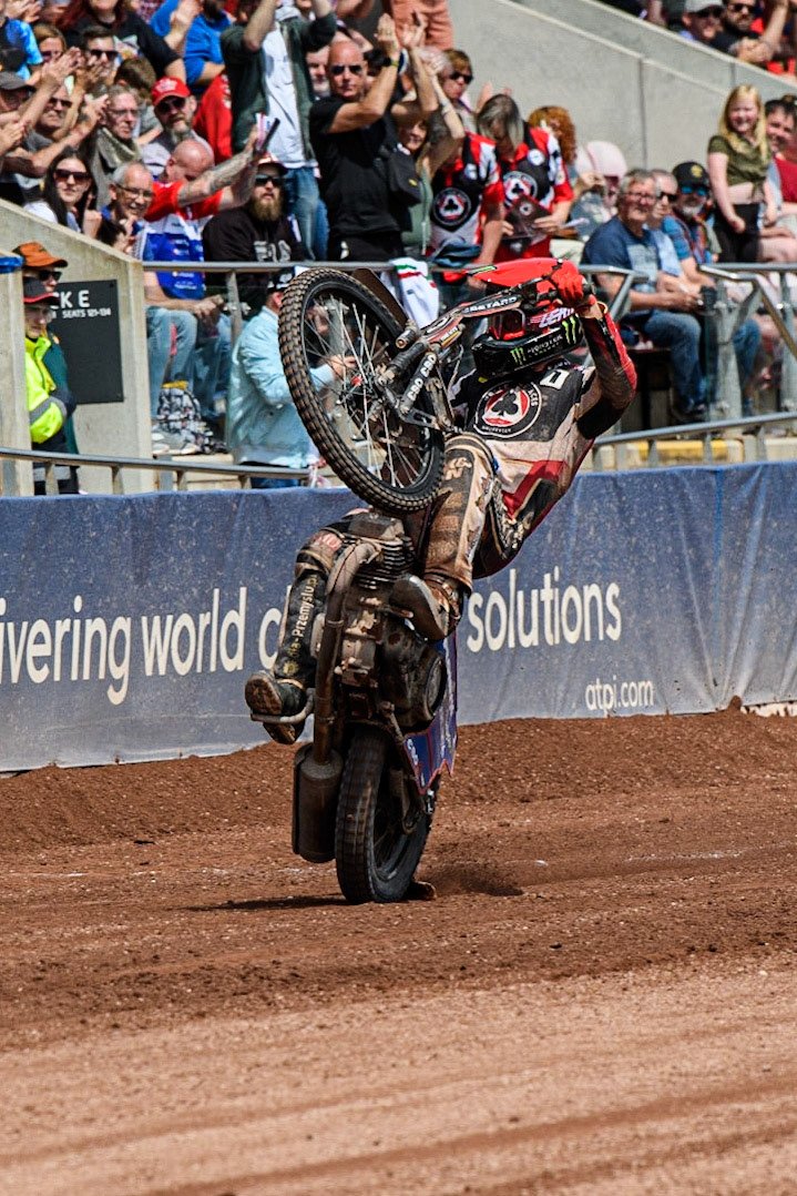Dan Bewley celebrates with a wheelie during the Sports Insure Premiership match between Belle Vue Aces and Wolverhampton Wolves at the National Speedway Stadium, Manchester on Monday 29th May 2023. (Photo: Ian Charles | MI News)