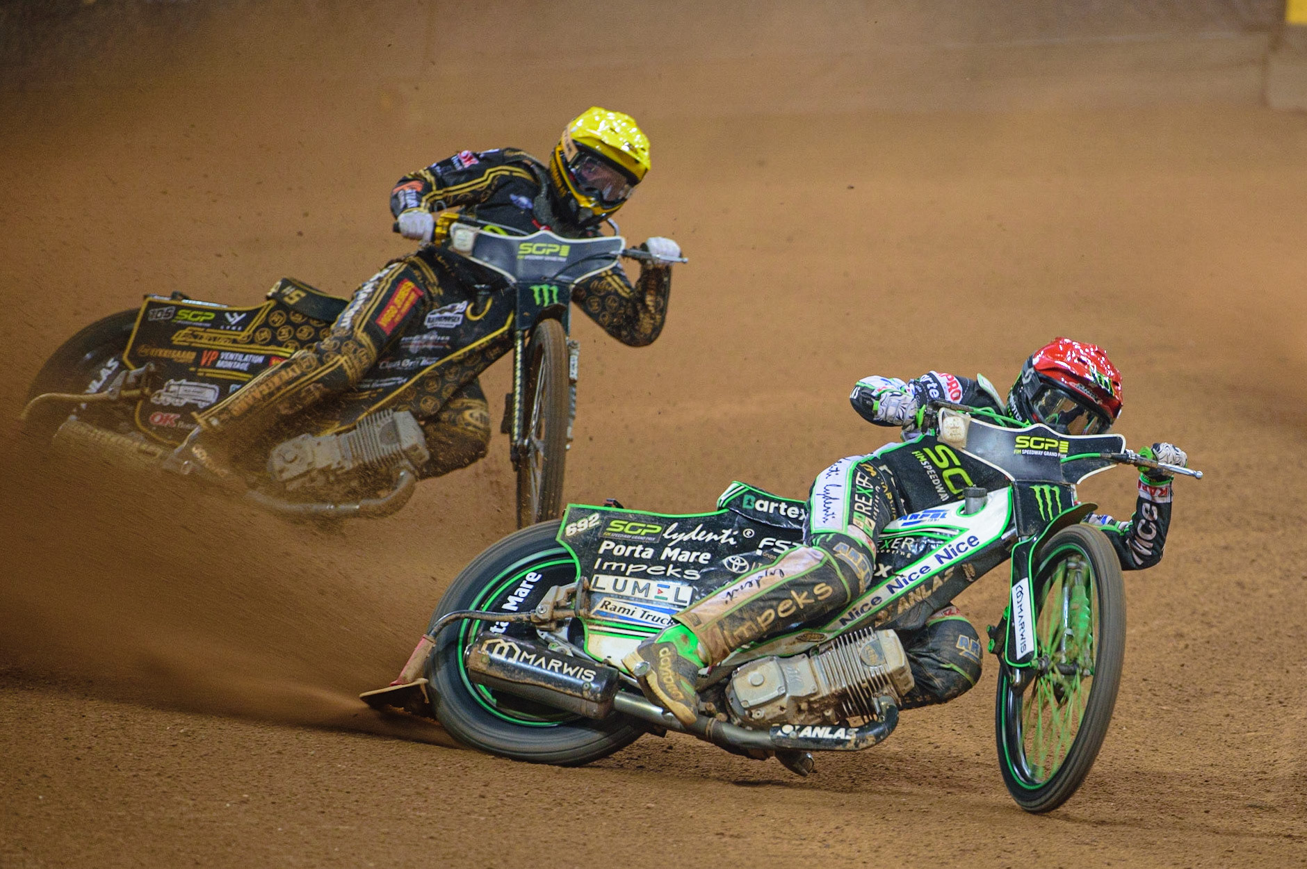 Patryk Dudek (692) (Red) leads Anders Thomsen (105) (Yellow) during the FIM  Speedway Grand Prix of Great Britain at the Principality Stadium, Cardiff on Saturday 13th August 2022. (Credit: Ian Charles | MI News