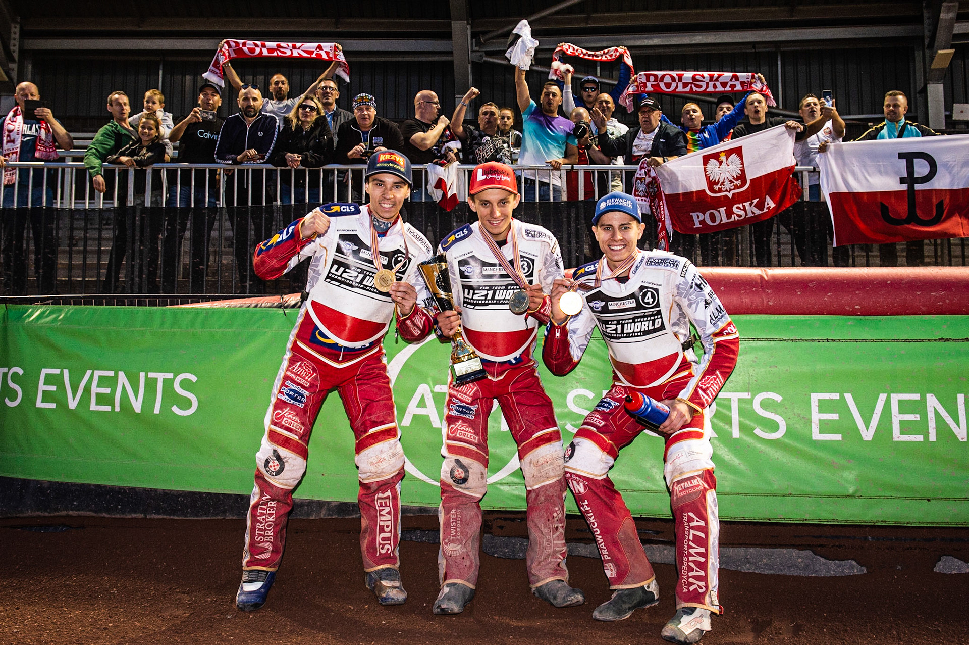 Photo: Ian Charles

(l-r) Dominik Kubera  Wiktor Lampart and Bartosz Smektala celebrate with their fans 

FIM Team Speedway U-21 World Championship, National Speedway Stadium, Manchester Friday 12 July  2019