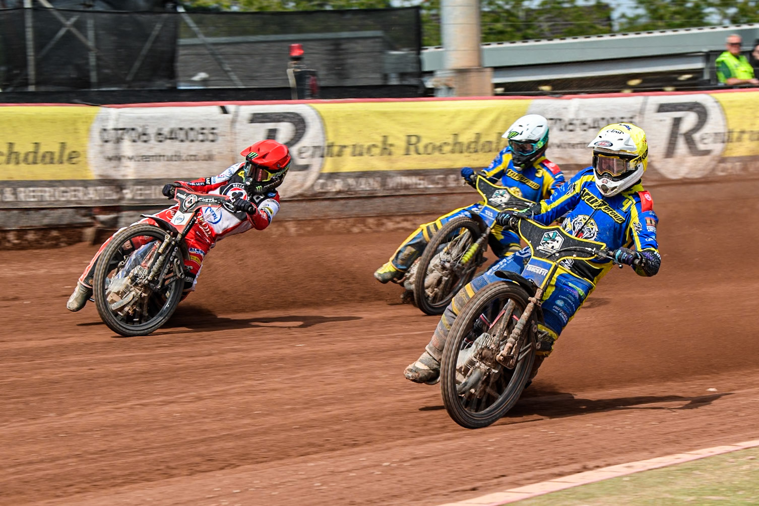 Sheffield Tigers' Josh Pickering  in Yellow rides inside Belle Vue Aces' Dan Bewley   in Red and Sheffield Tigers' Chris Holder  in White during the Rowe Motor Oil Premiership match between Belle Vue Aces and Sheffield Tigers at the National Speedway Stadium, Manchester on Monday 26th August 2024. (Photo: Ian Charles | MI News)