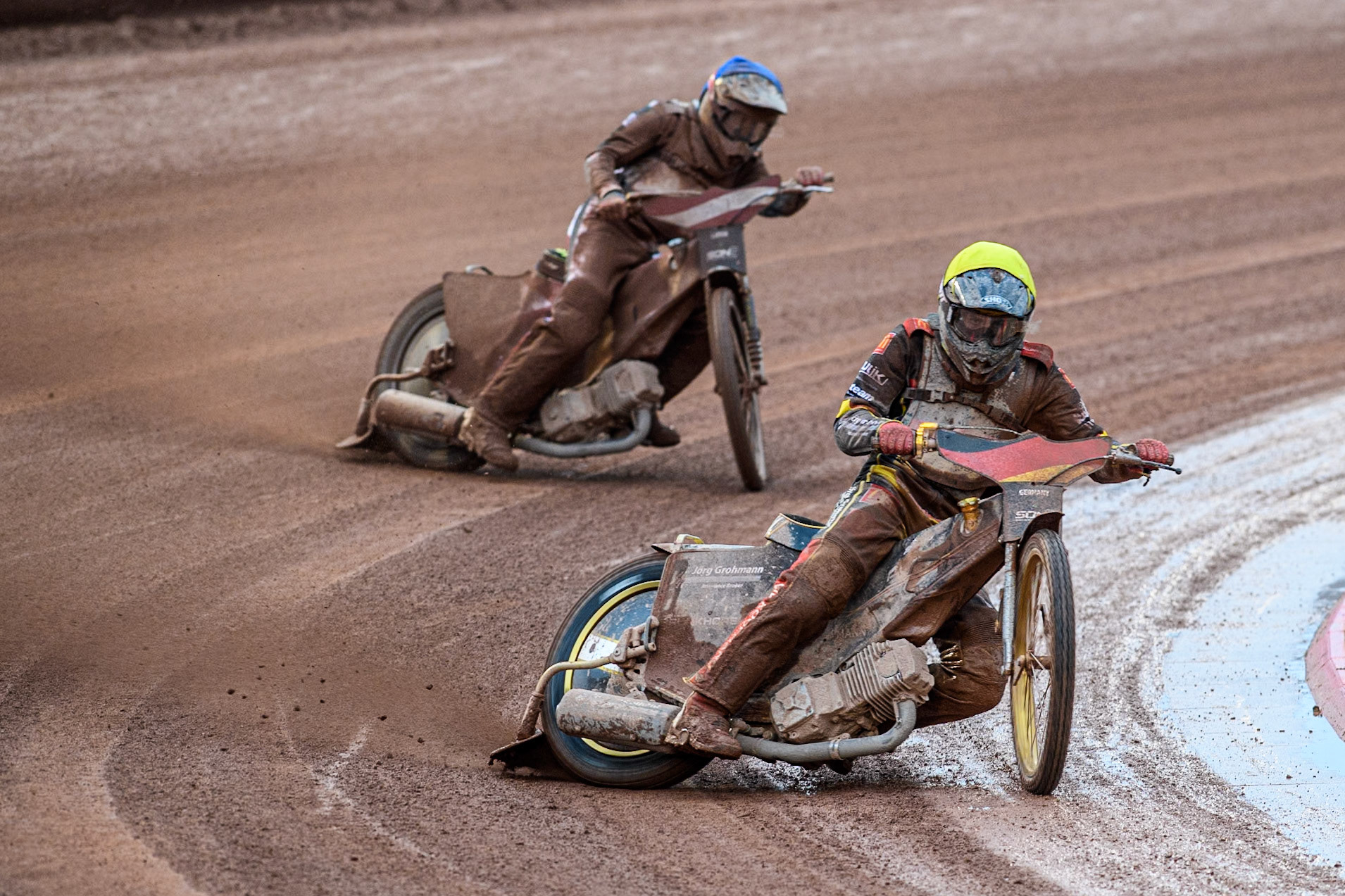 Norick Blödorn of Germany in Yellow leading Nikita Kaulins of Latvia in Blue during the Monster Energy FIM Speedway of Nations 2 (Under 21) Final at the National Speedway Stadium, Manchester on Friday 12th July 2024. (Photo: Ian Charles | MI News)