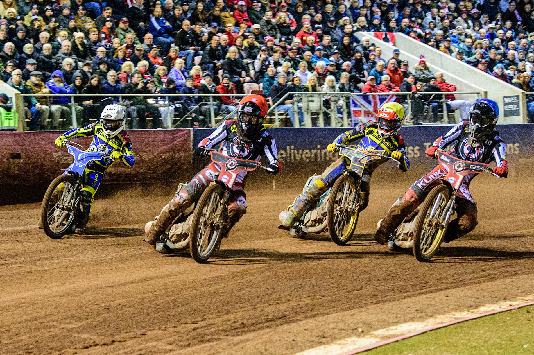 Tom Brennan  (Red) leads Norick Blödorn  (Blue), Connor Mountain  (Yellow) and Lewis Kerr  (White) during the SGB Premiership Grand Final 1st leg between Belle Vue Aces and Sheffield Tigers at the National Speedway Stadium, Manchester on Monday 10th October 2022. (Credit: Ian Charles | MI News)