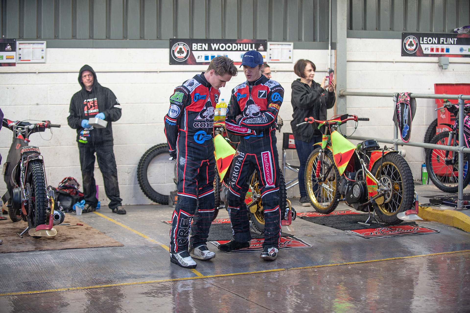 Photo: Ian Charles

Riders shelter from the rain after a downpour before the meeting

Belle Vue Colts v Kent Kings, SGB National League, Belle Vue National Speedway Stadium, Manchester, Thursday 1  August  2019