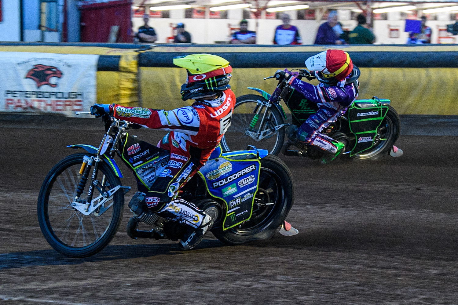 Jaimon Lidsey (Yellow) inside Benjamin Basso (Red) during the Sports Insure Premiership match between Peterborough and Belle Vue Aces at East of England Showground, Peterborough on Monday 26th June 2023. (Photo: Ian Charles | MI News)